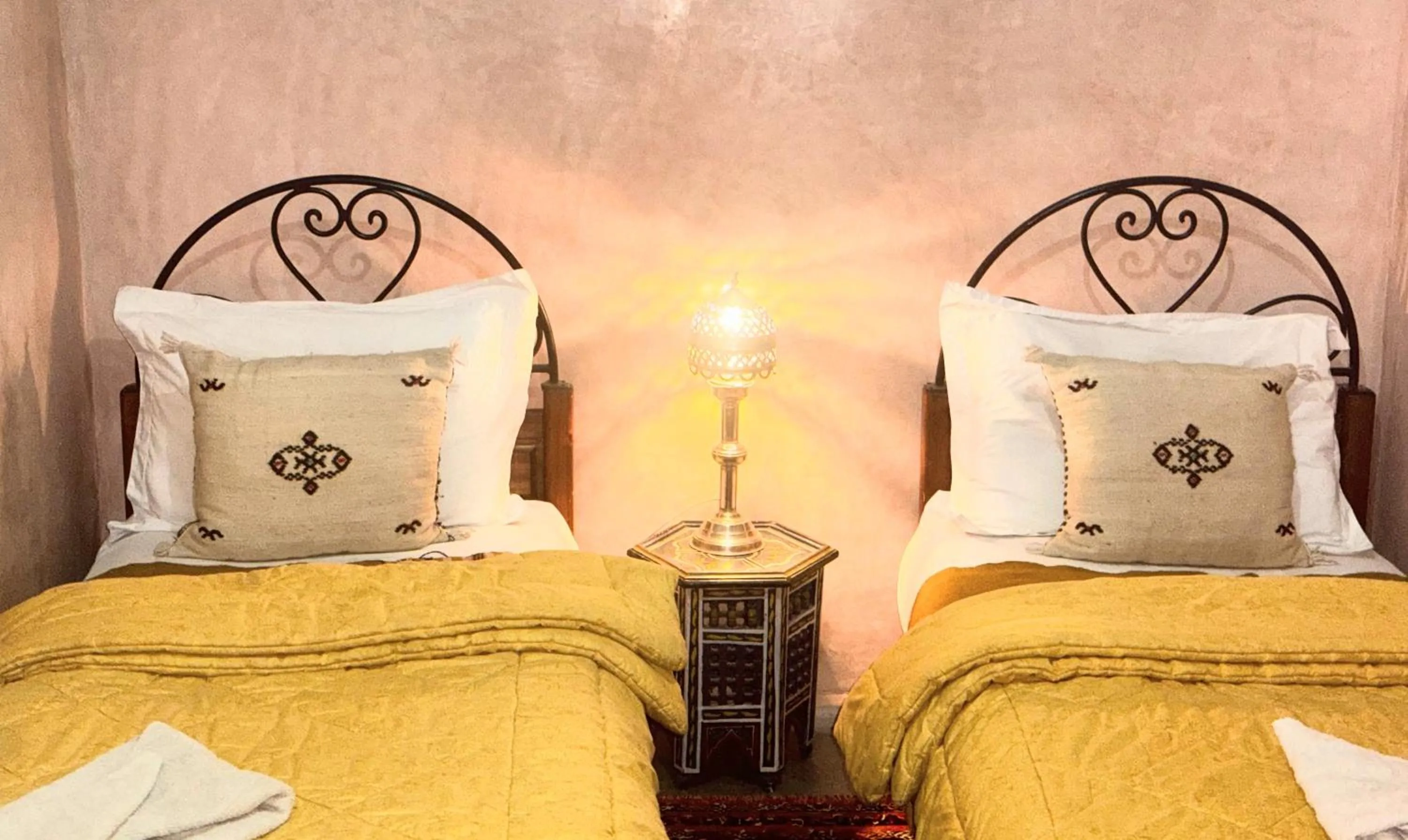 Bed in Riad Essaoussan
