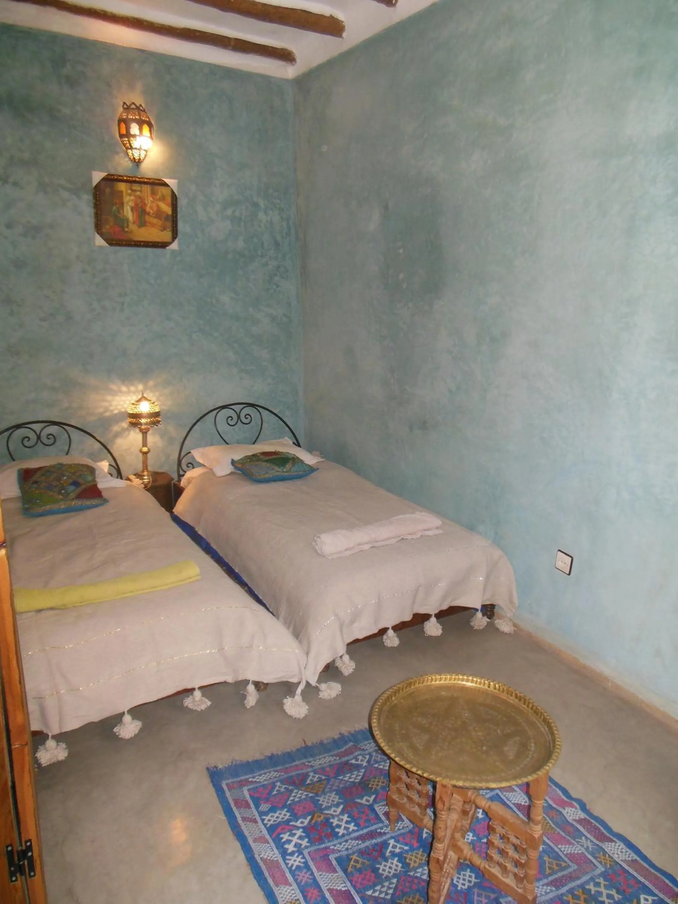 Bed in Riad Essaoussan