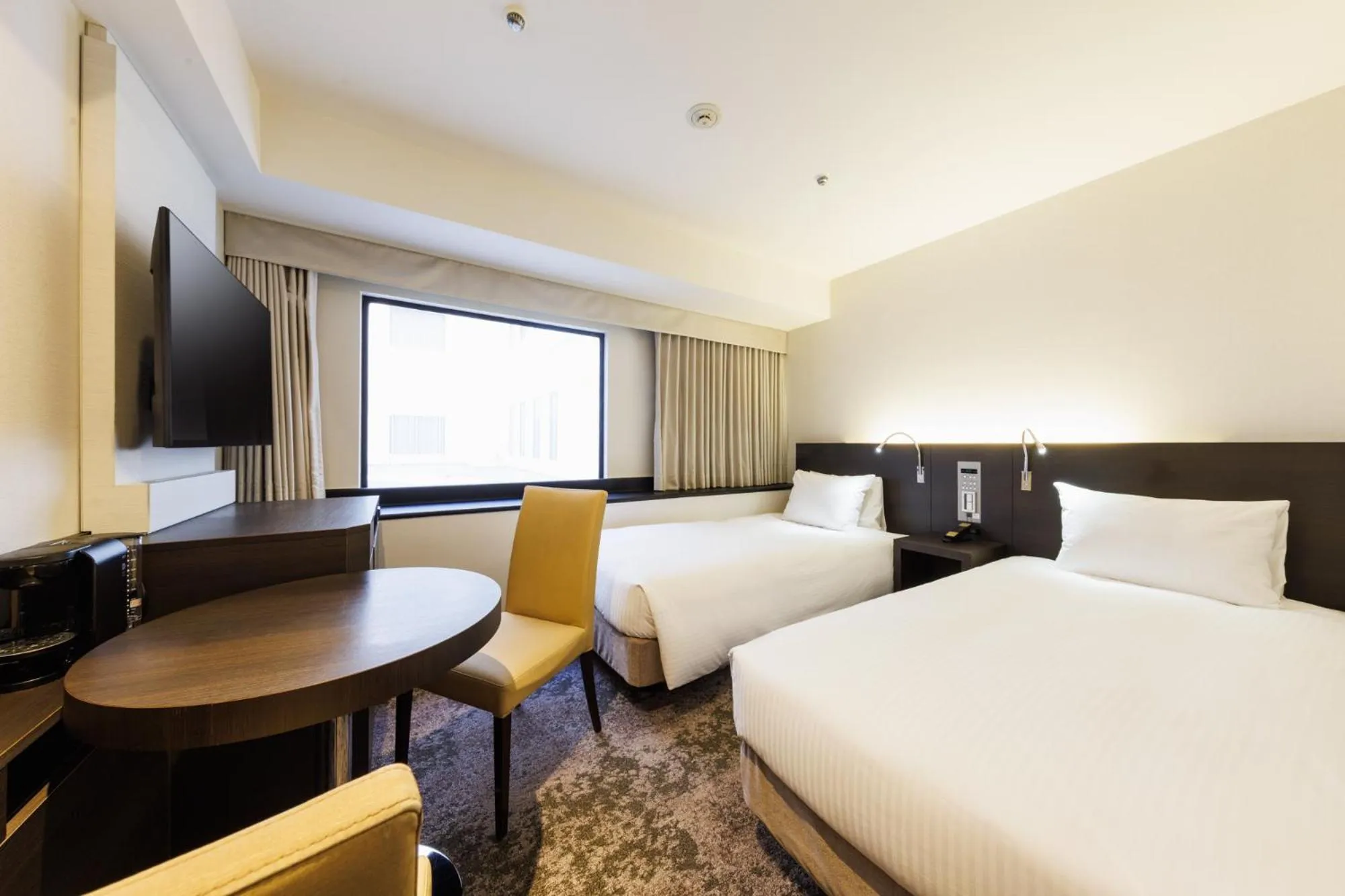 Bed in Kawasaki Nikko Hotel