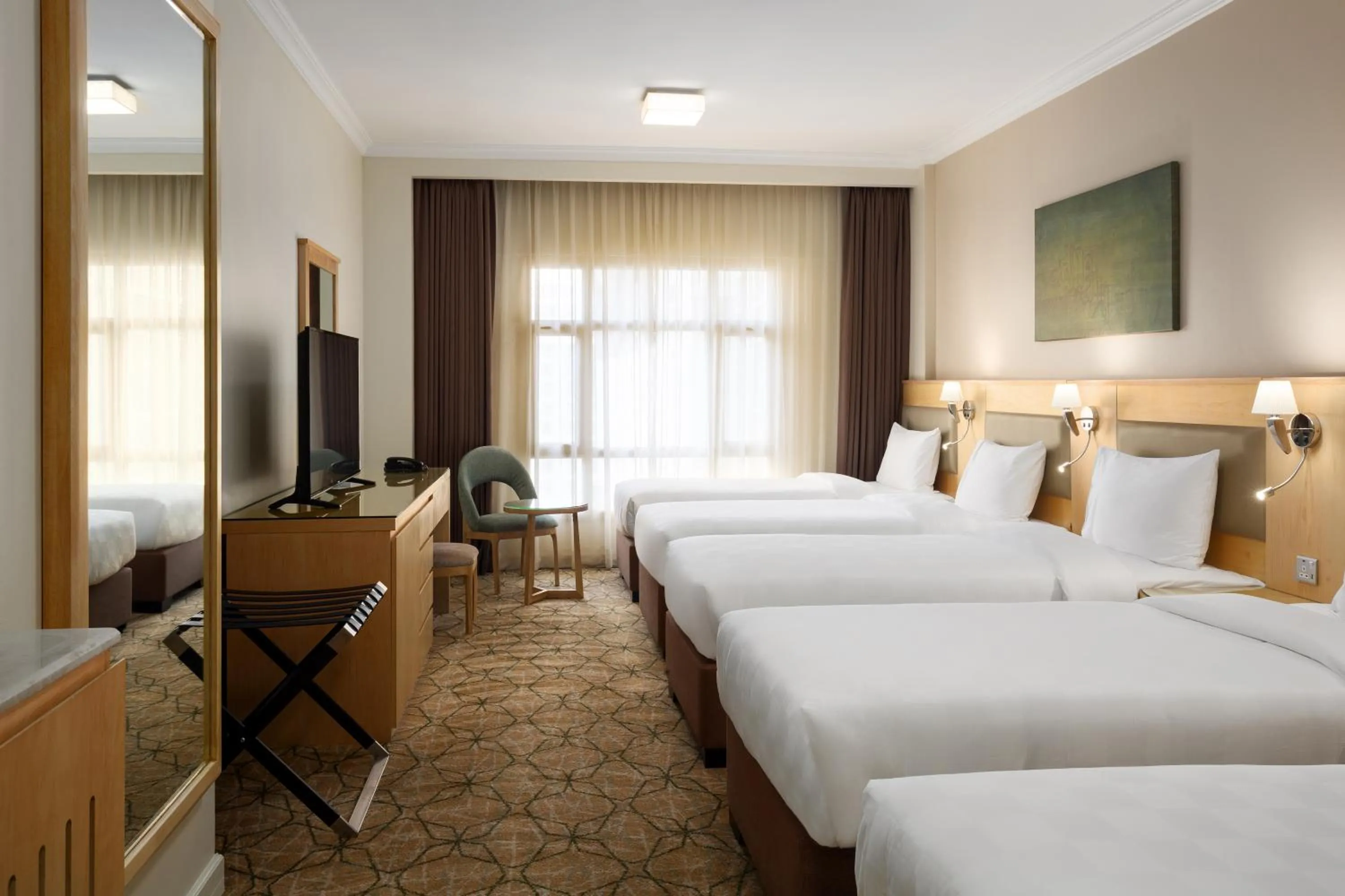 Bed in SAJA By Warwick Madinah Hotel