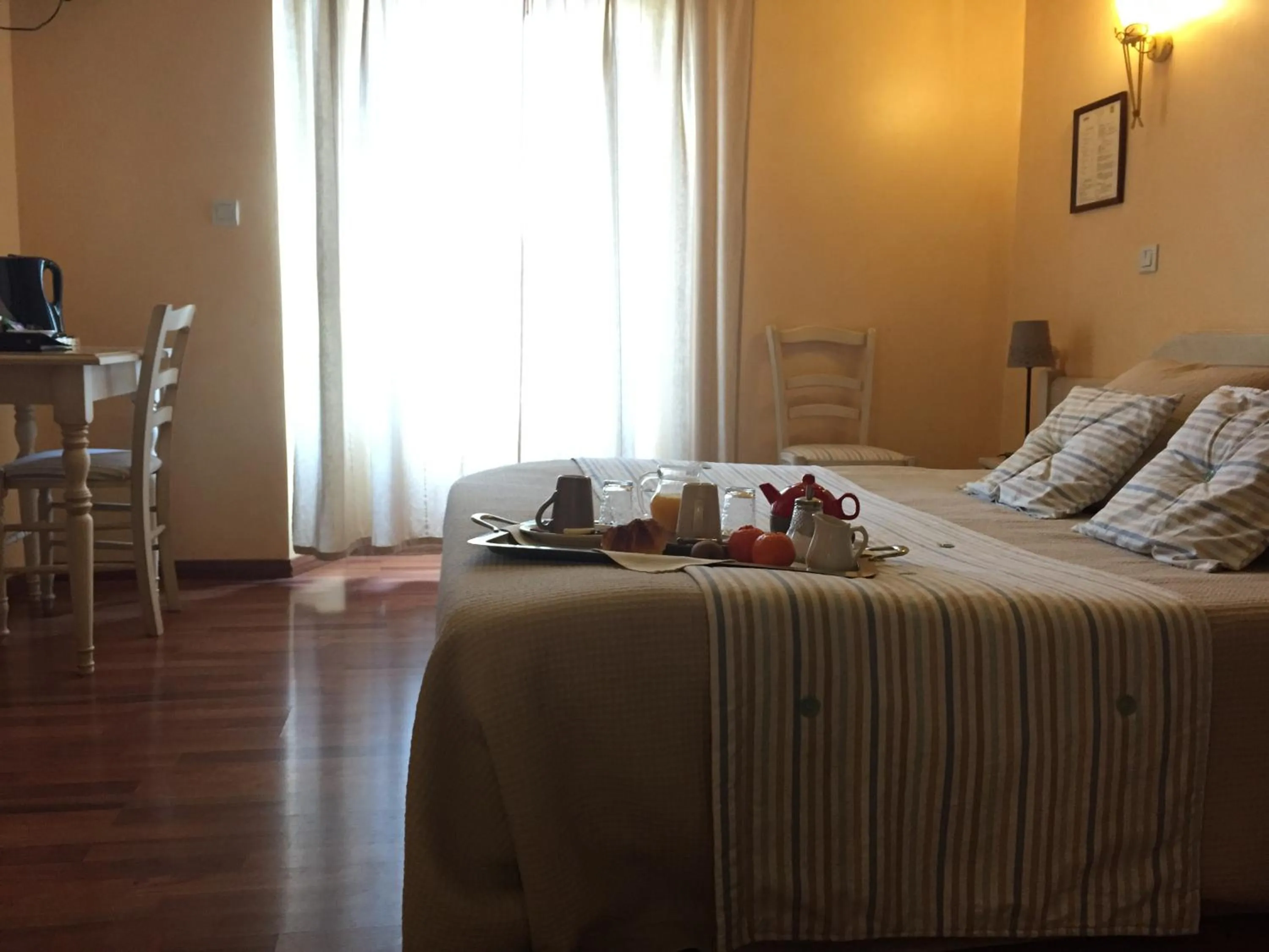 Bed in Logis Hôtel Les 3B