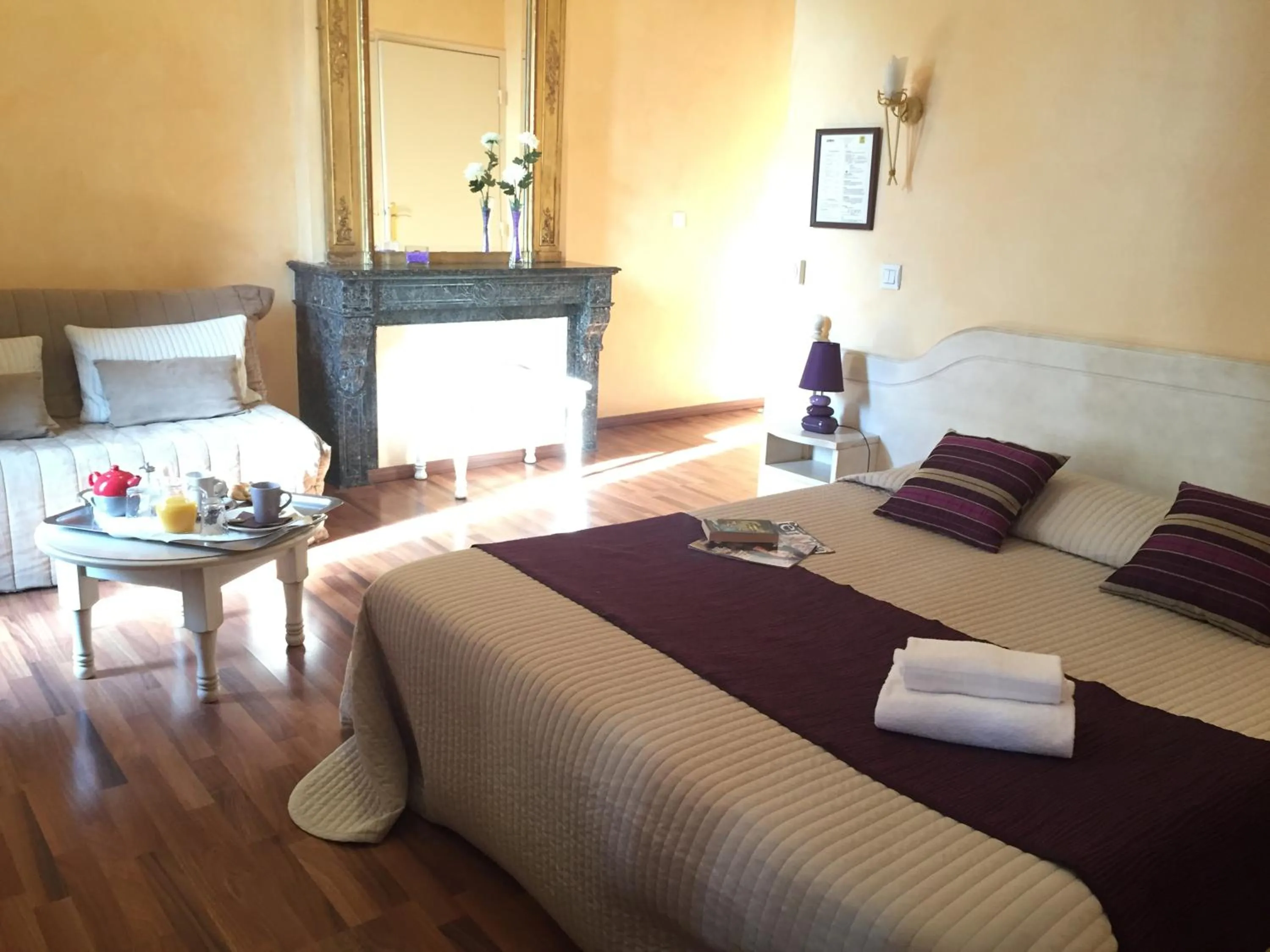 Bed in Logis Hôtel Les 3B