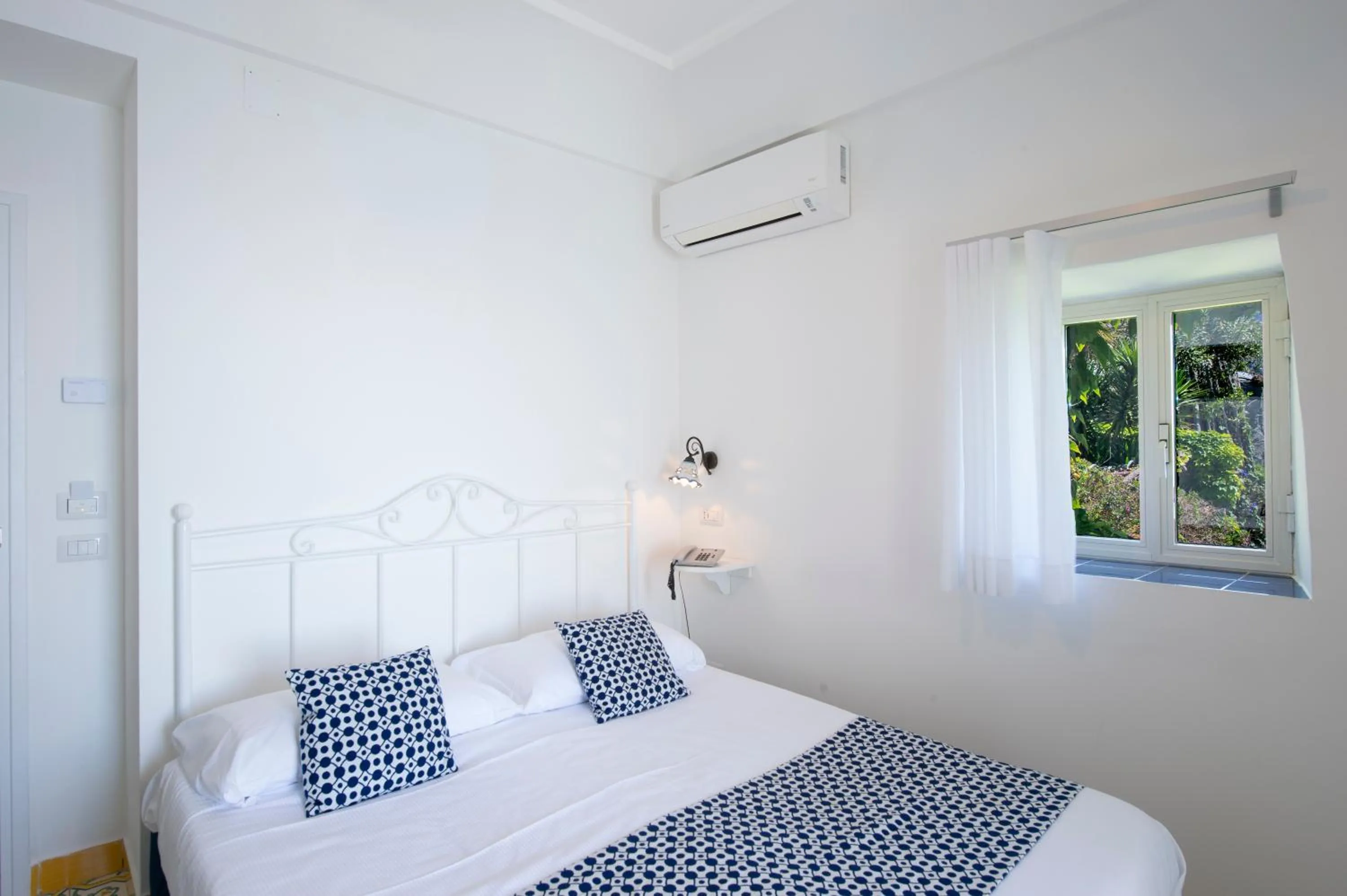 Bed in Hotel Costa Diva