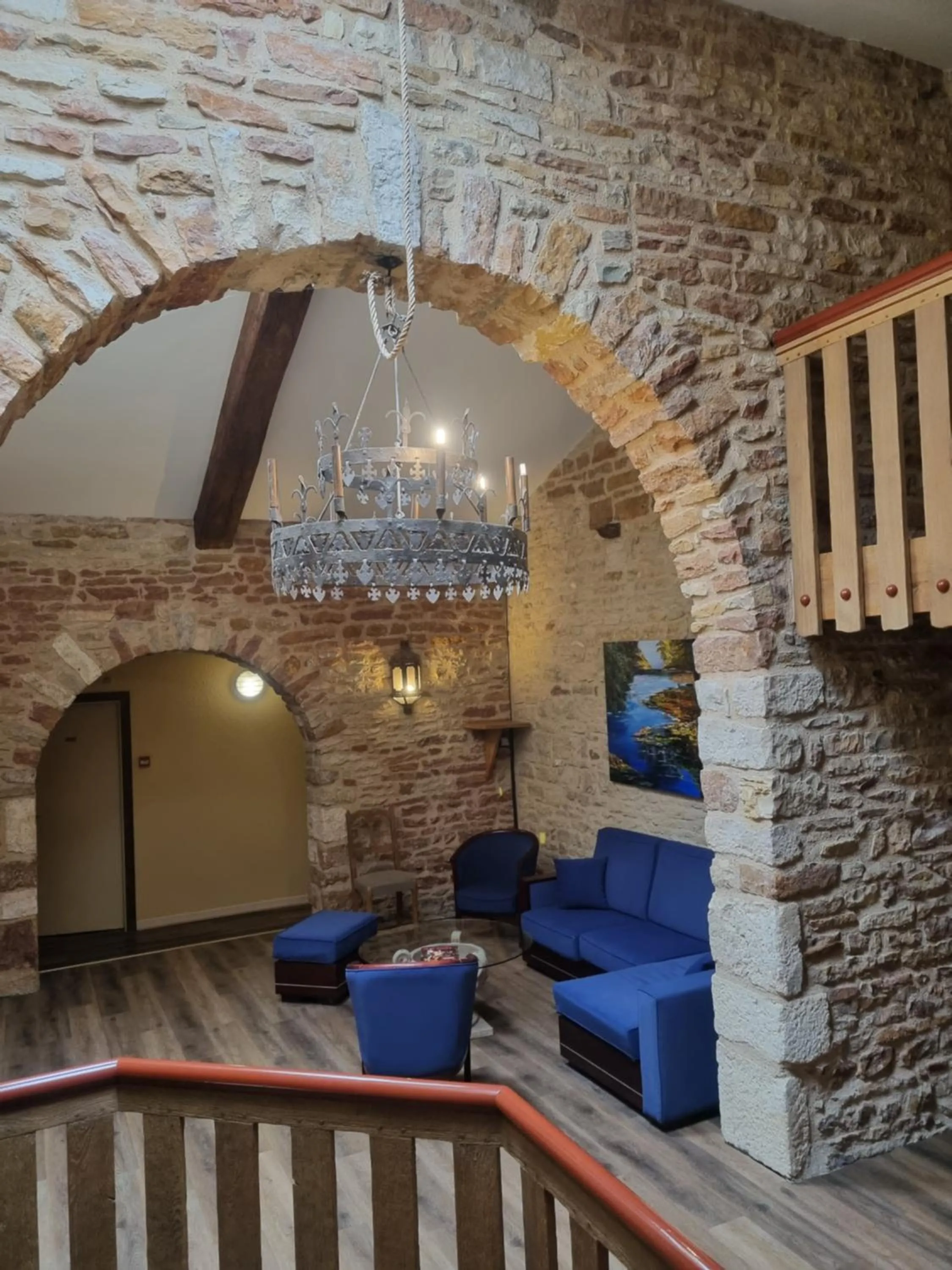 Seating area in Logis Hôtel La Fleur de Lys