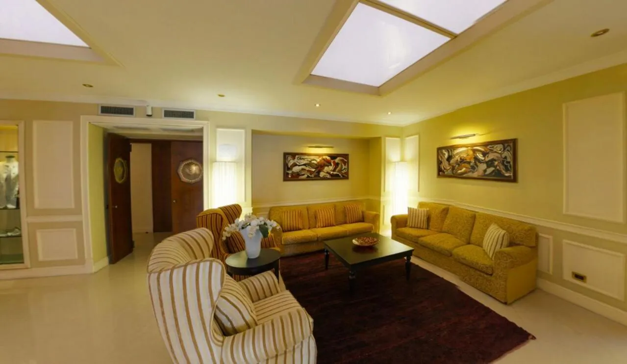 Communal lounge/ TV room in Hotel Miramare & Spa