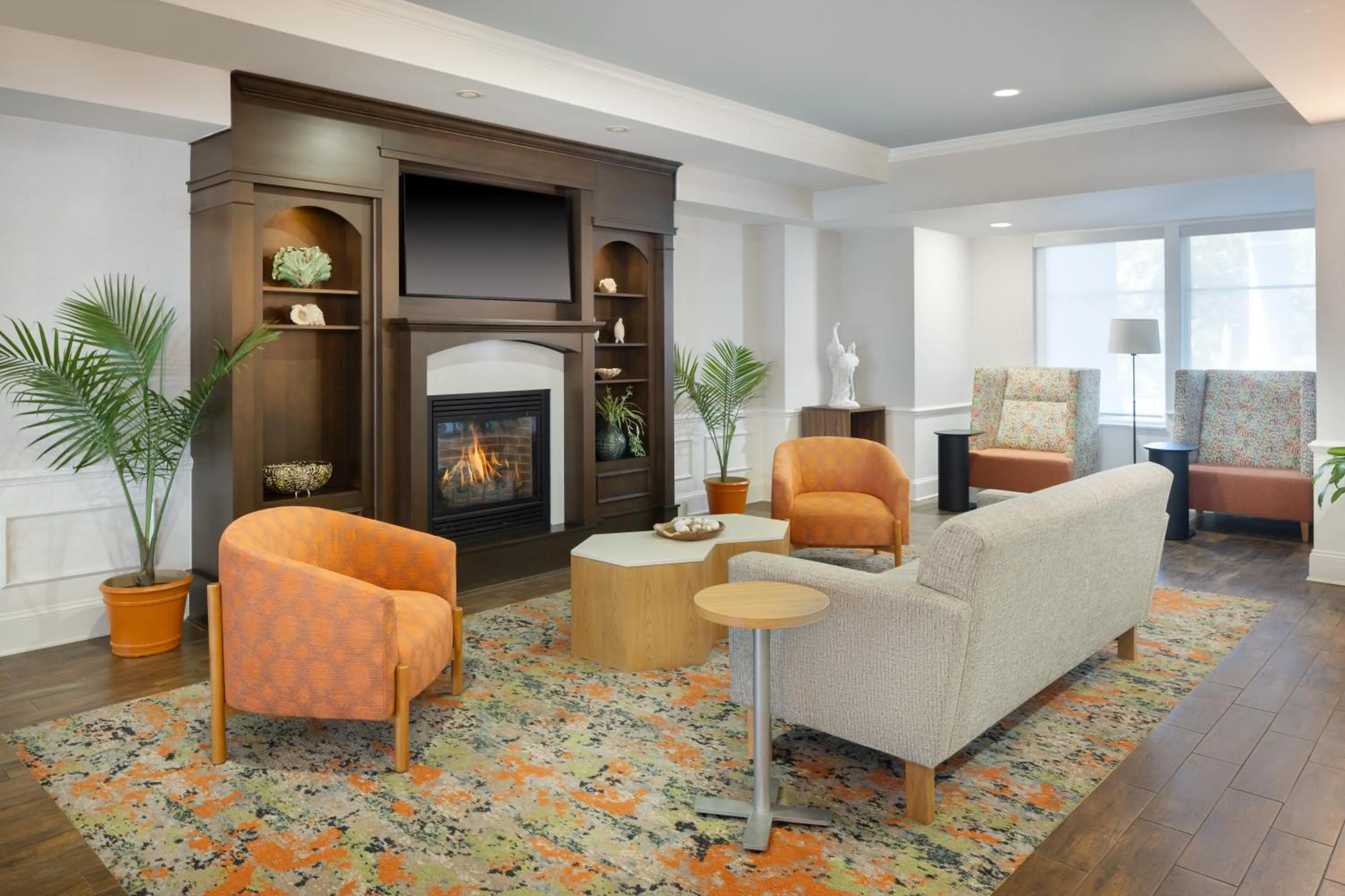 Communal lounge/ TV room in Hampton Inn & Suites Jekyll Island