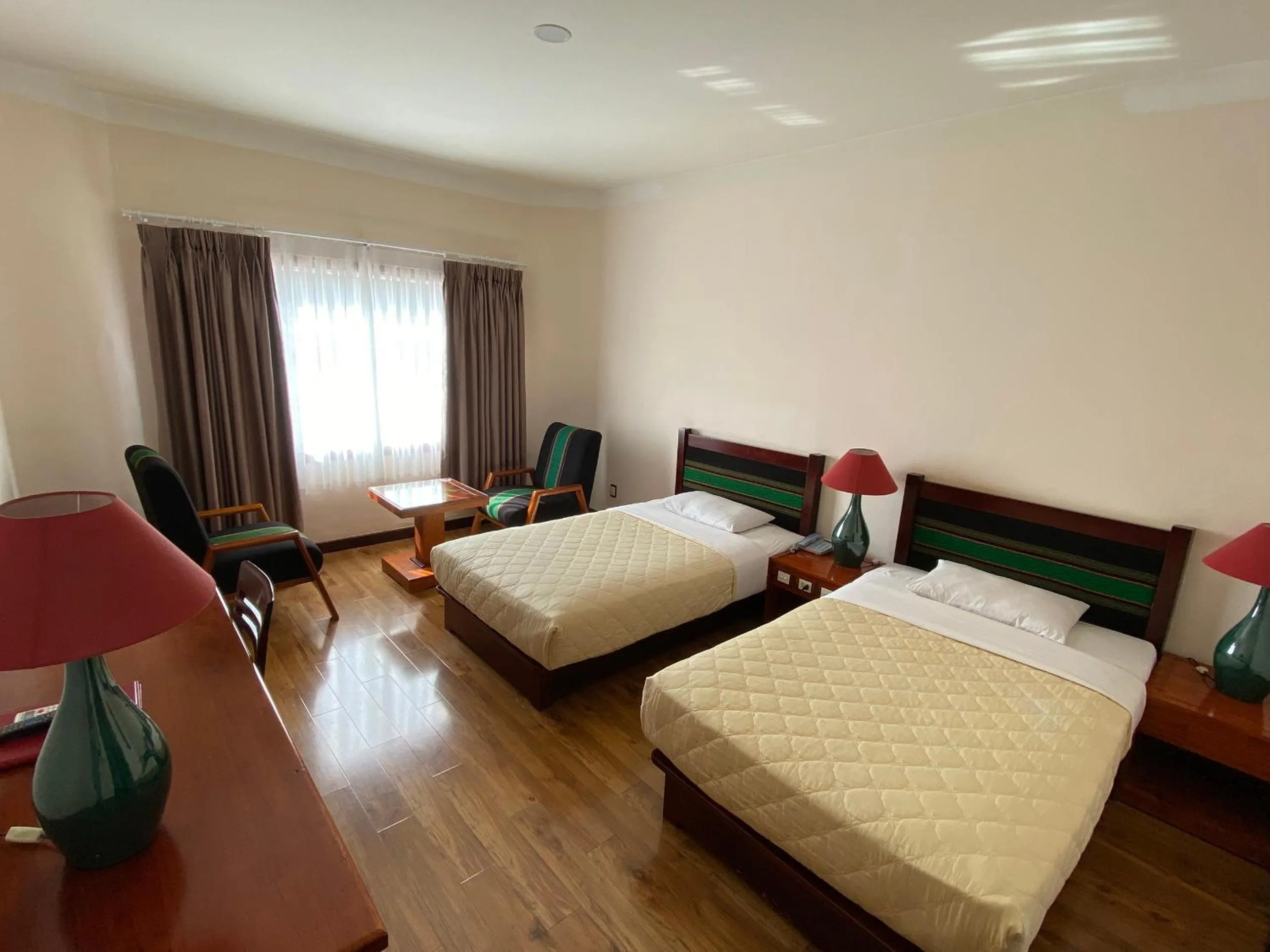 Bed in Dam San Hotel