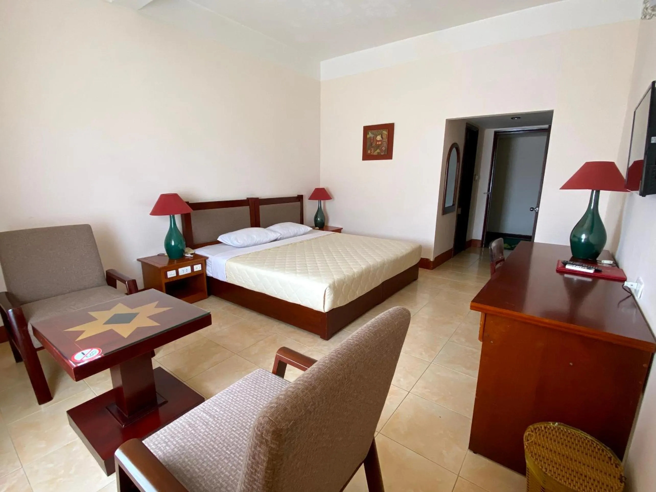 Bed in Dam San Hotel