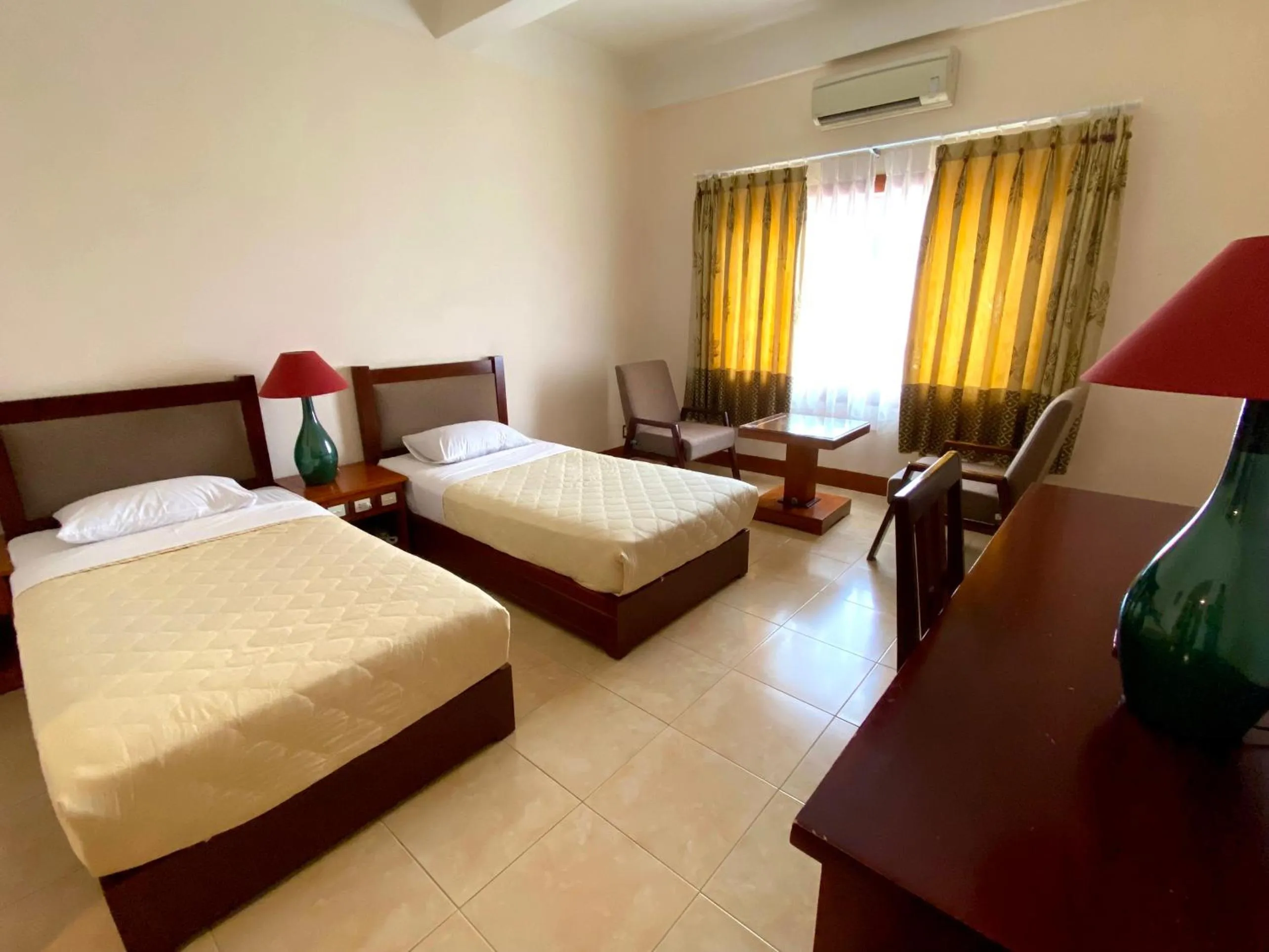 Bed in Dam San Hotel