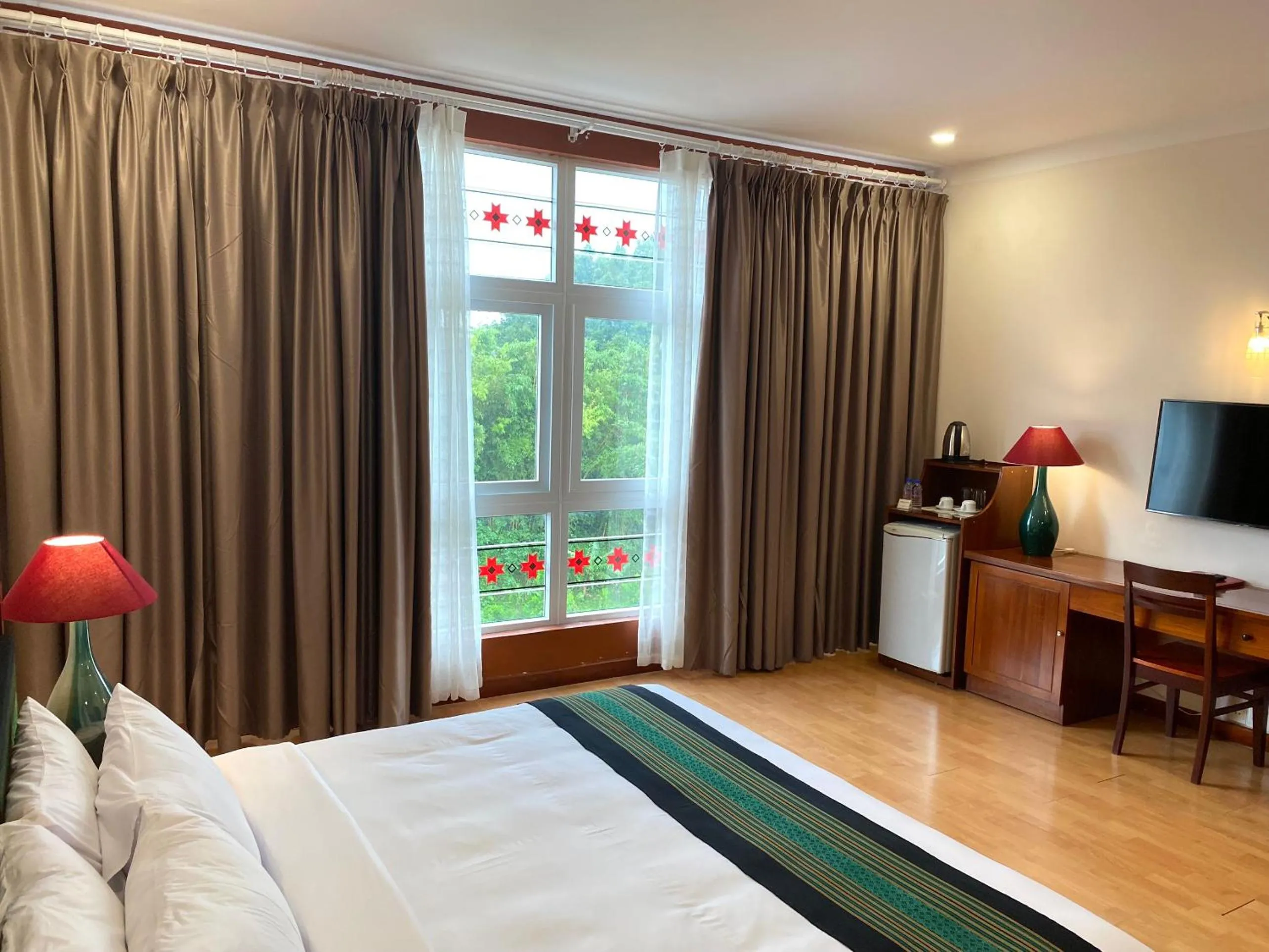 Bed in Dam San Hotel