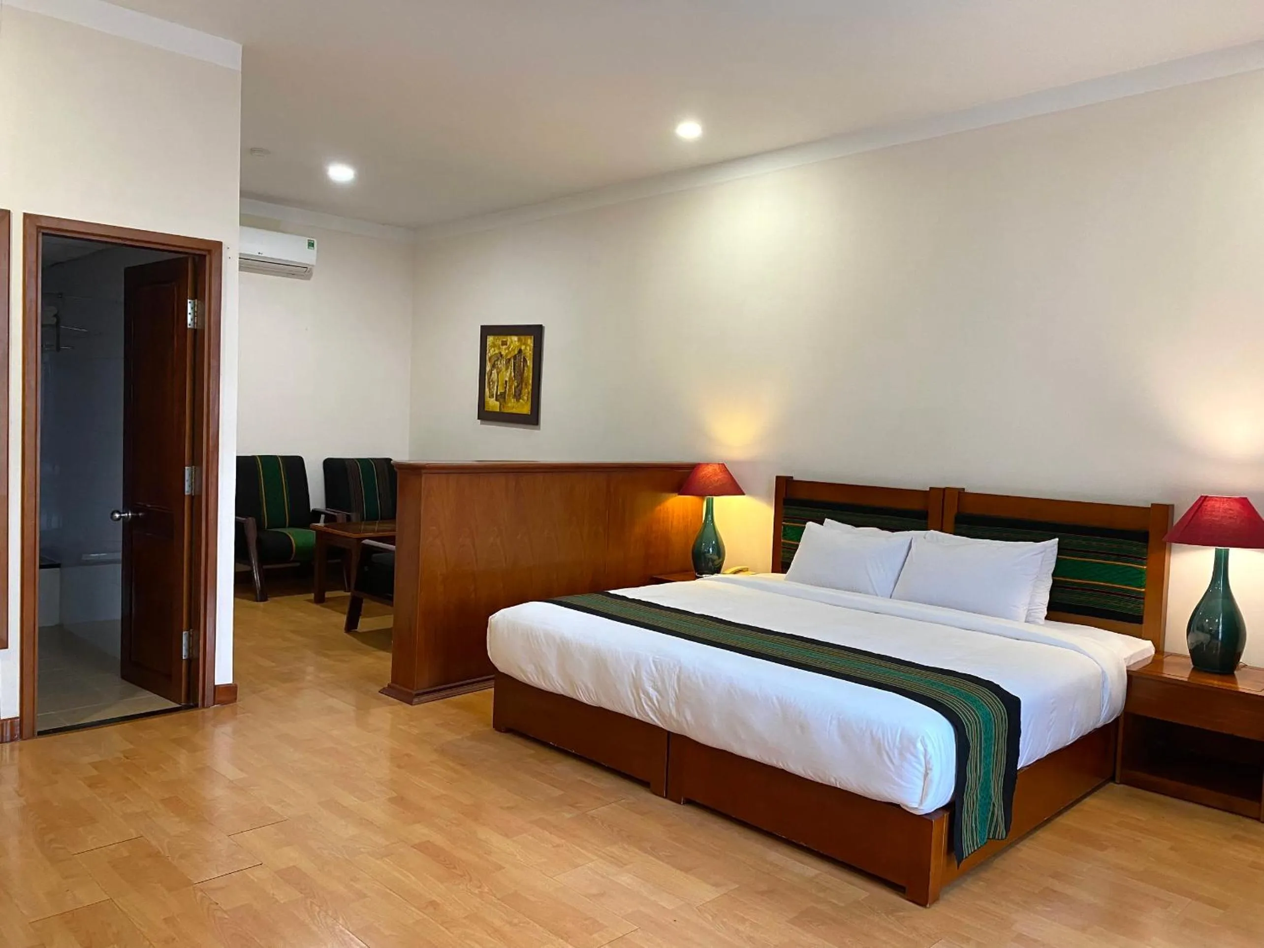 Bed in Dam San Hotel