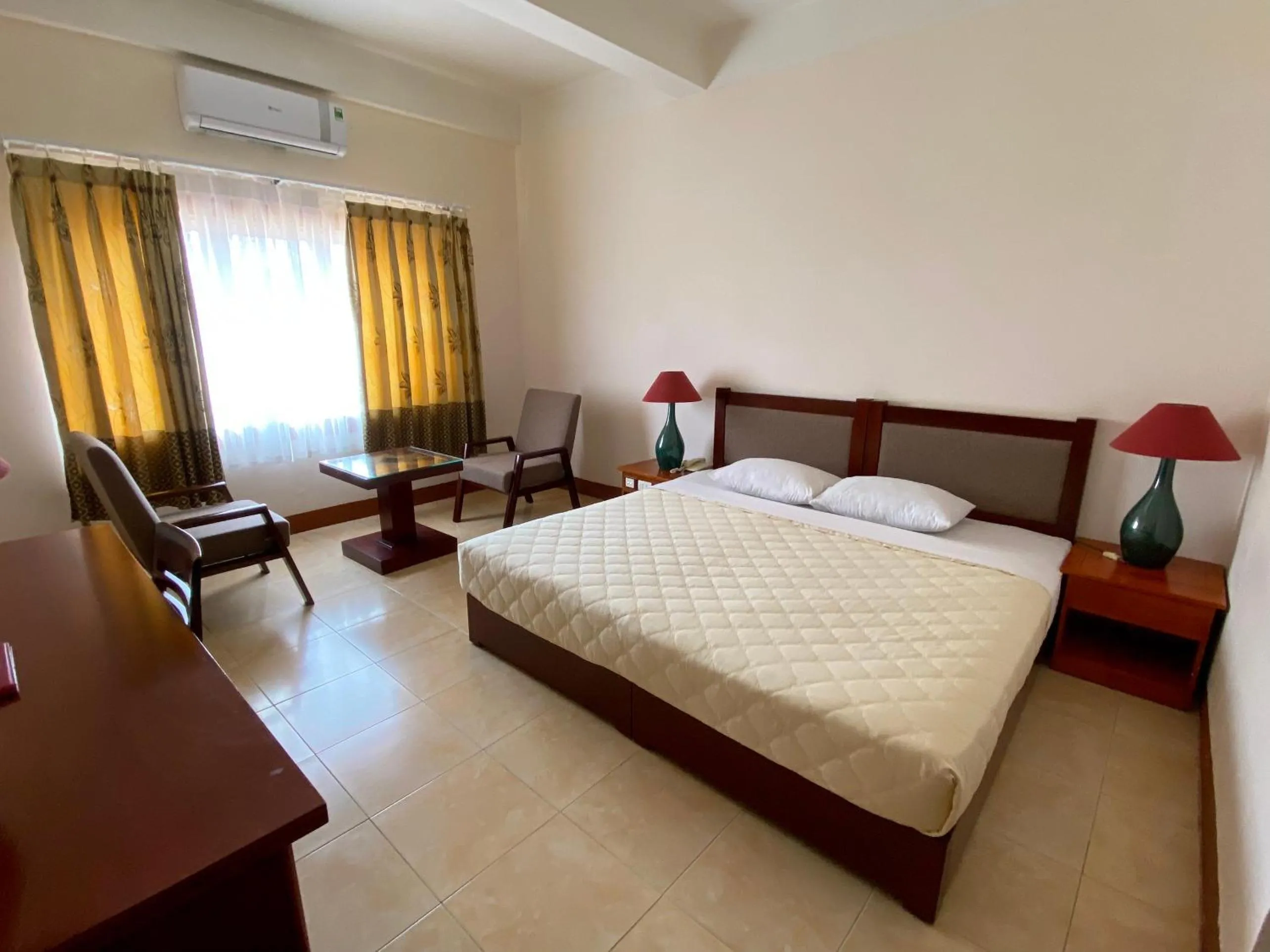 Bed in Dam San Hotel