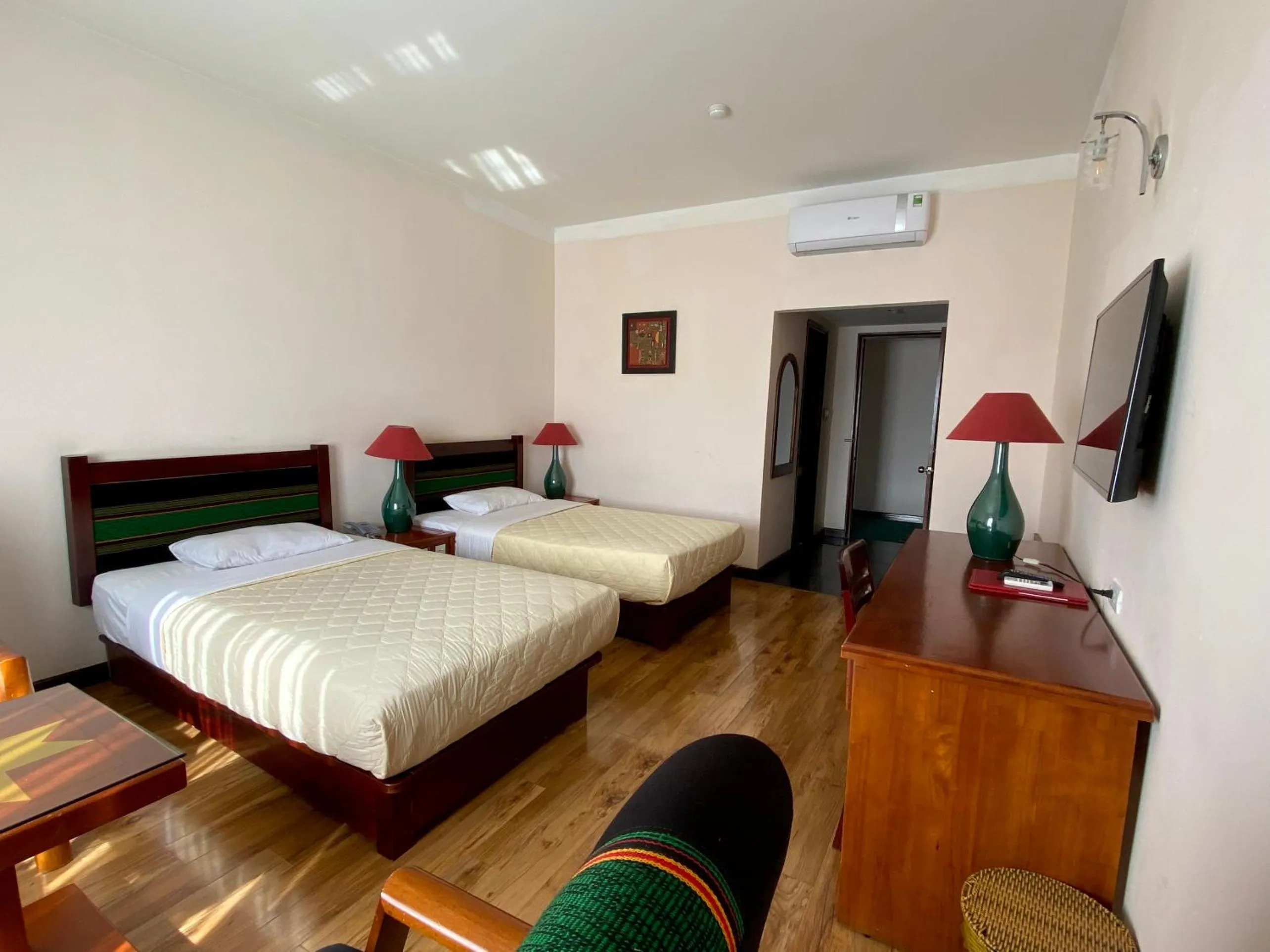 Bed in Dam San Hotel