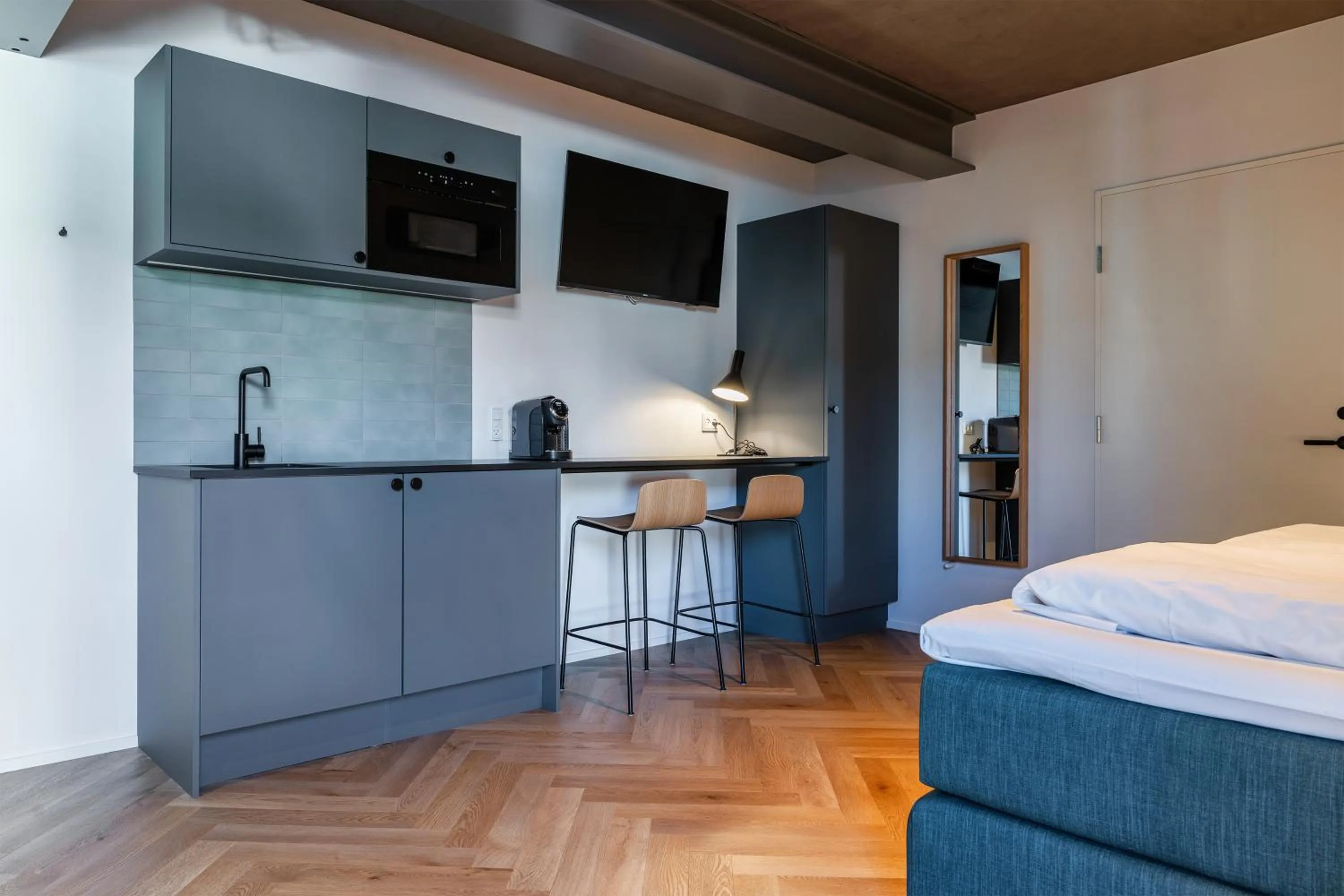 Kitchen or kitchenette, Bed in Hotel Skjern