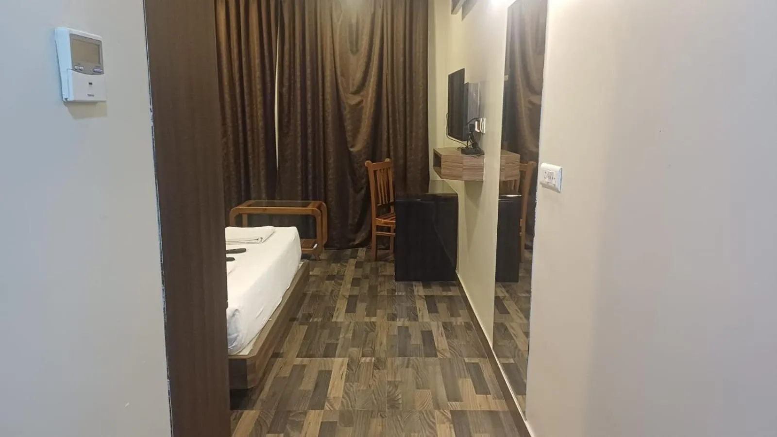 Bedroom in Hotel Sriram JB Residency