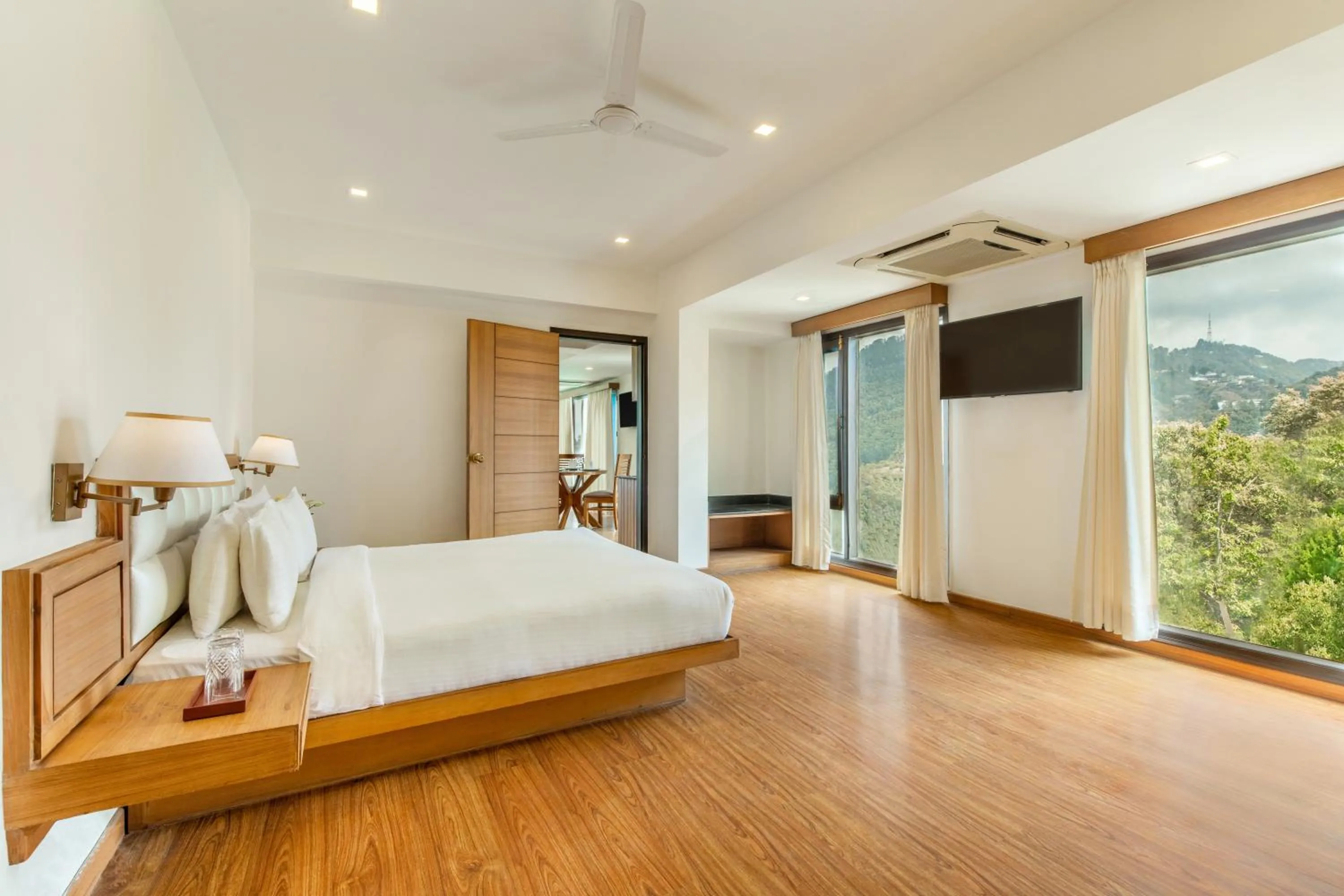 View (from property/room), Bed in Country Inn Premier Pacific Mall Road Mussoorie