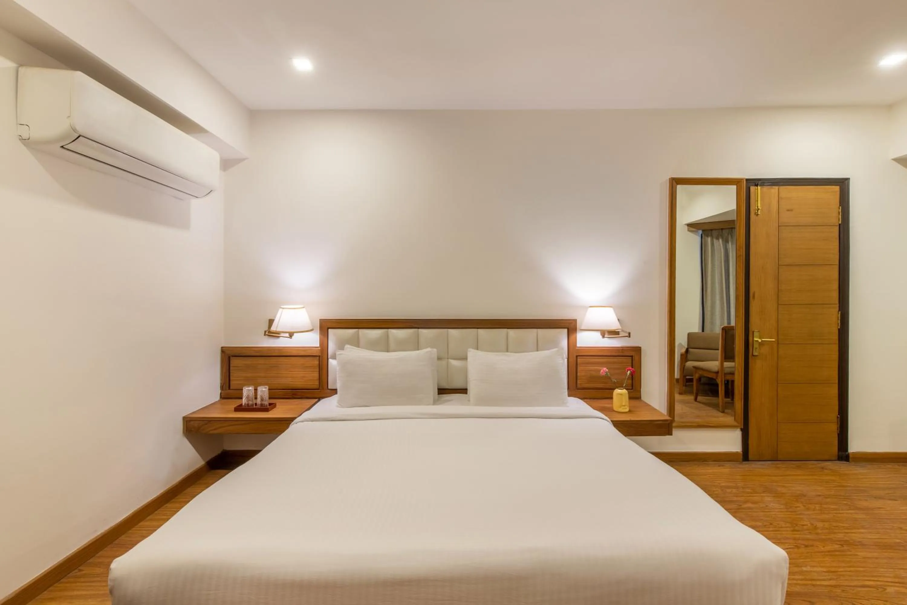 Bedroom, Bed in Country Inn Premier Pacific Mall Road Mussoorie