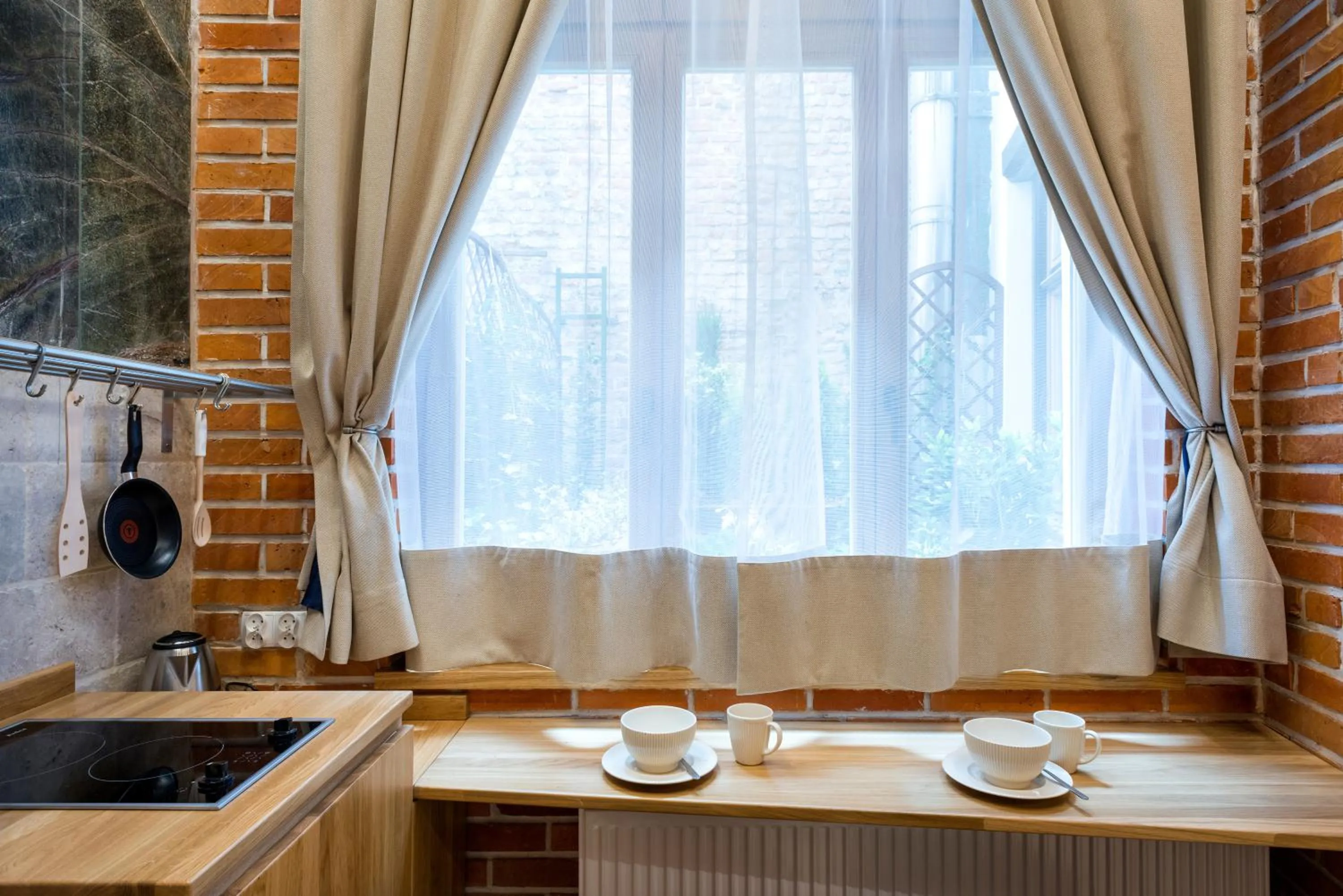 Kitchen or kitchenette in Aparthotel Stare Miasto