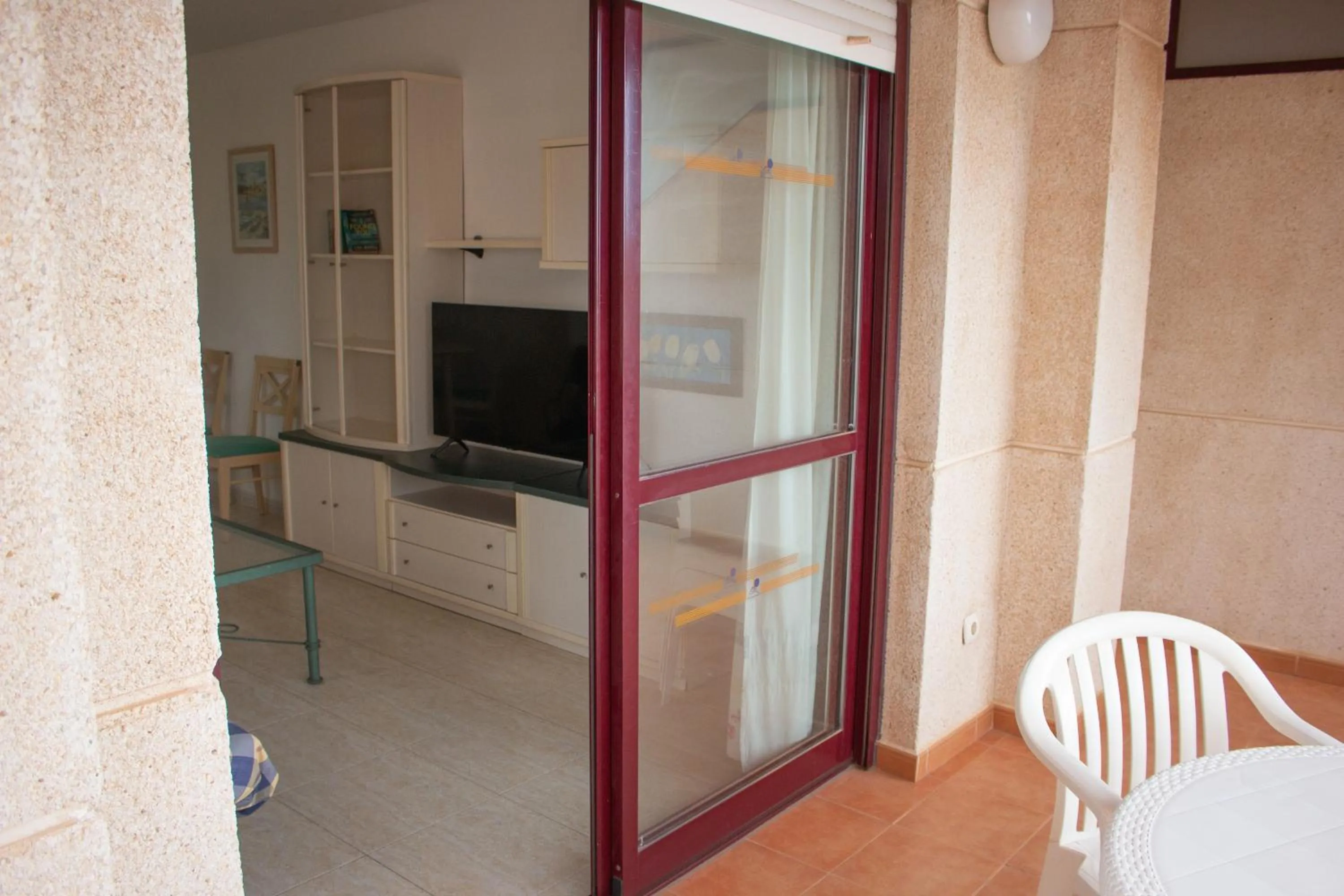 Communal lounge/ TV room in Apartamentos Coral Beach Unitursa