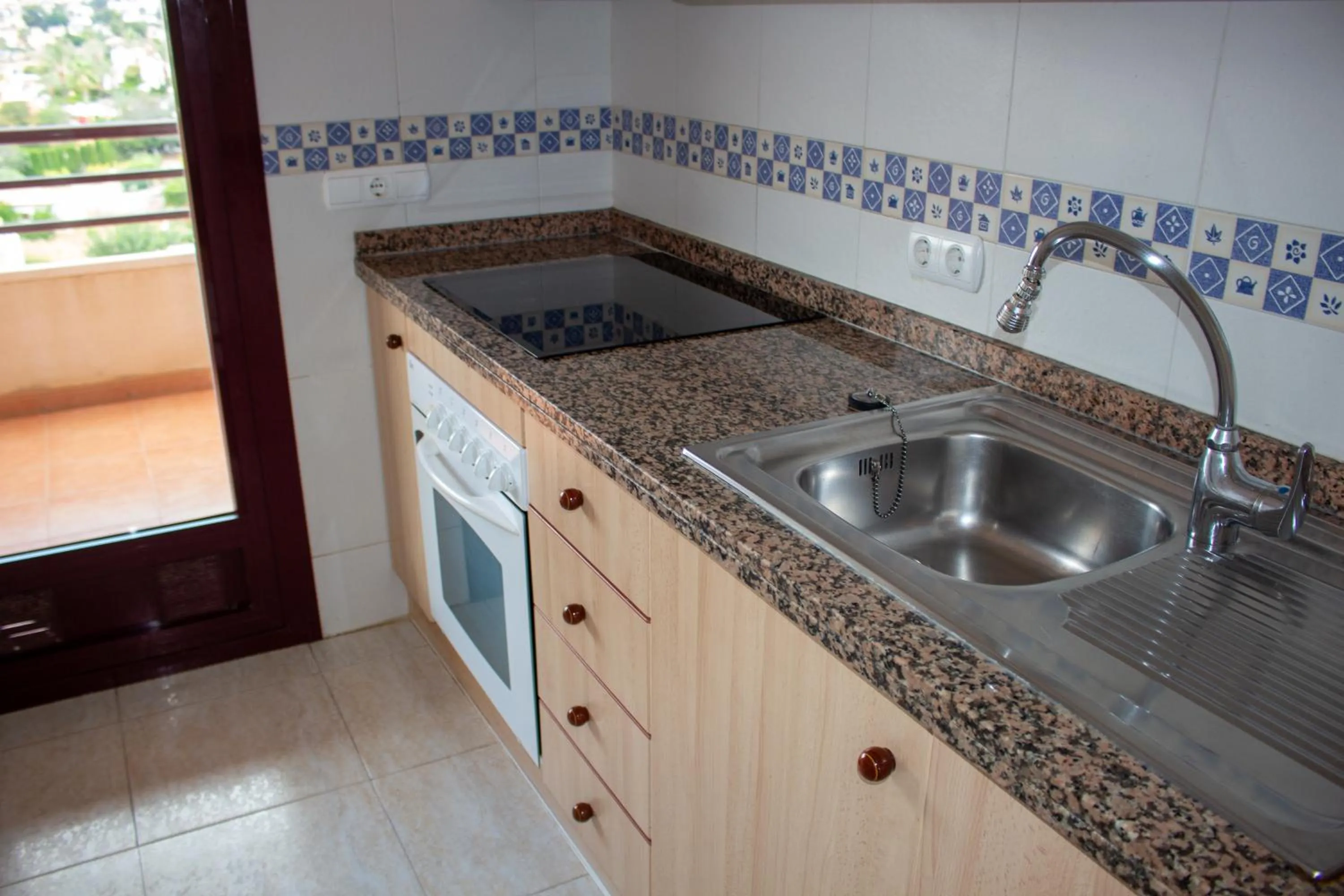 Kitchen or kitchenette in Apartamentos Coral Beach Unitursa