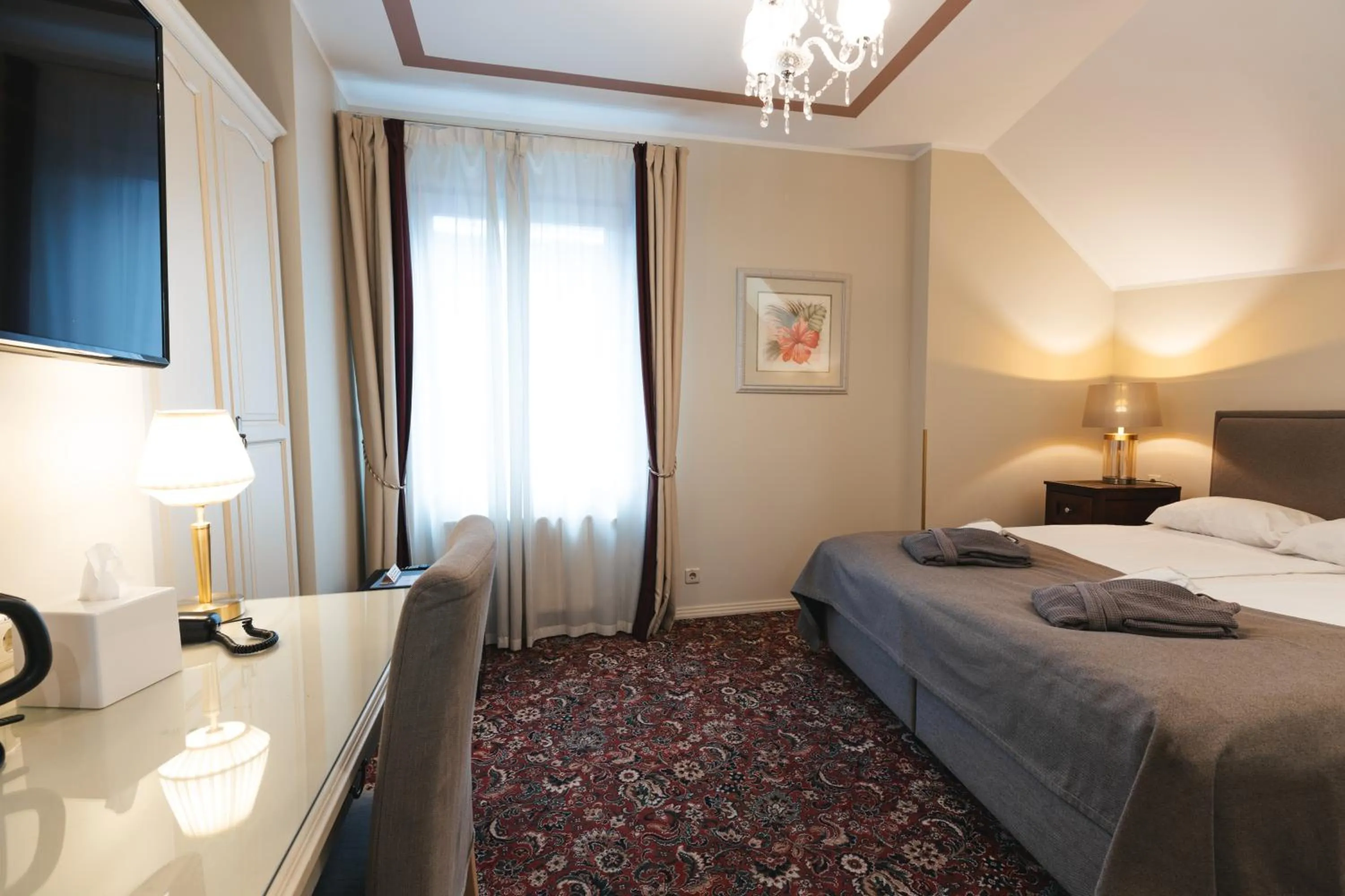 Photo of the whole room, Bed in Forums Boutique Hotel