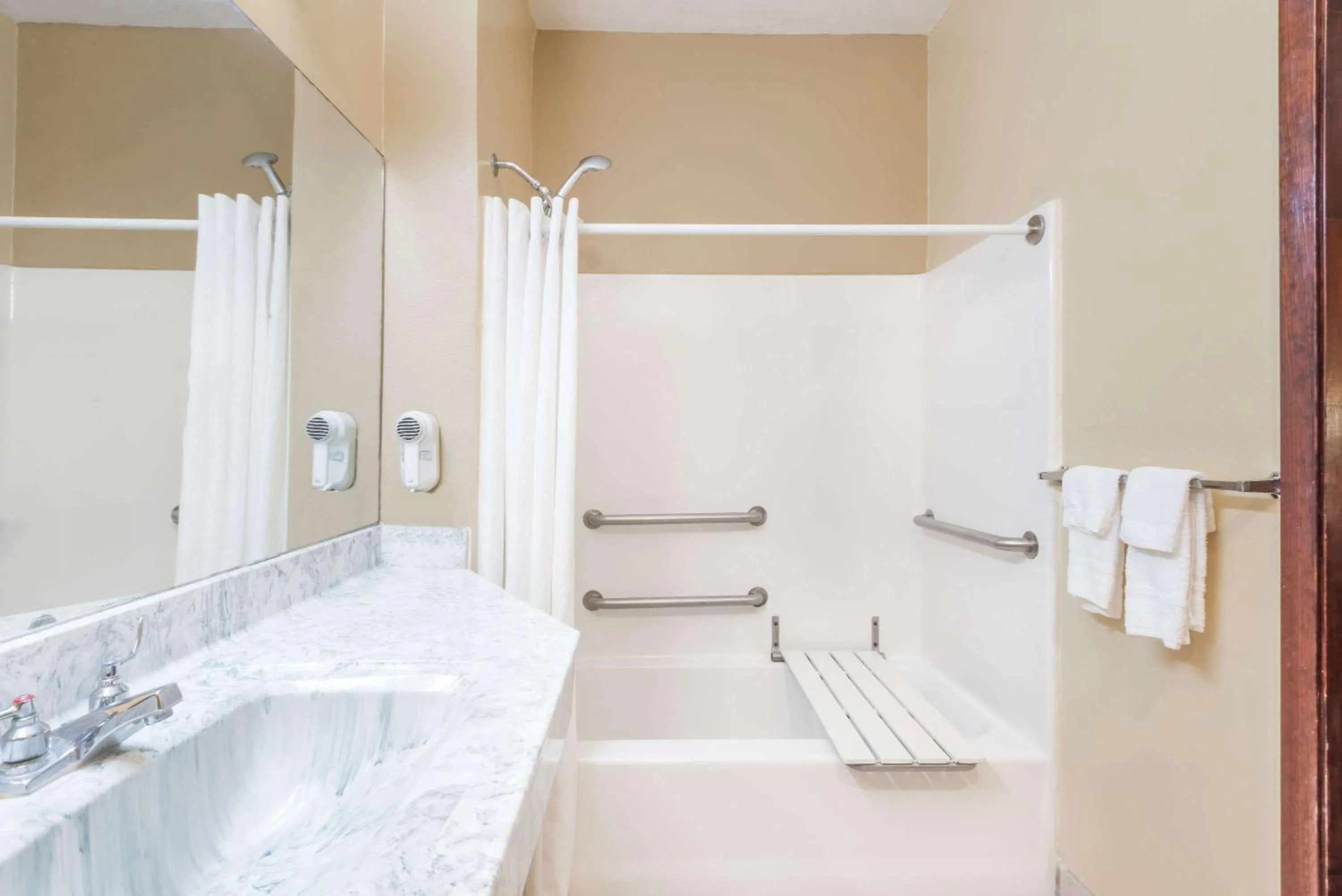 Bathroom in Super 8 by Wyndham Weslaco