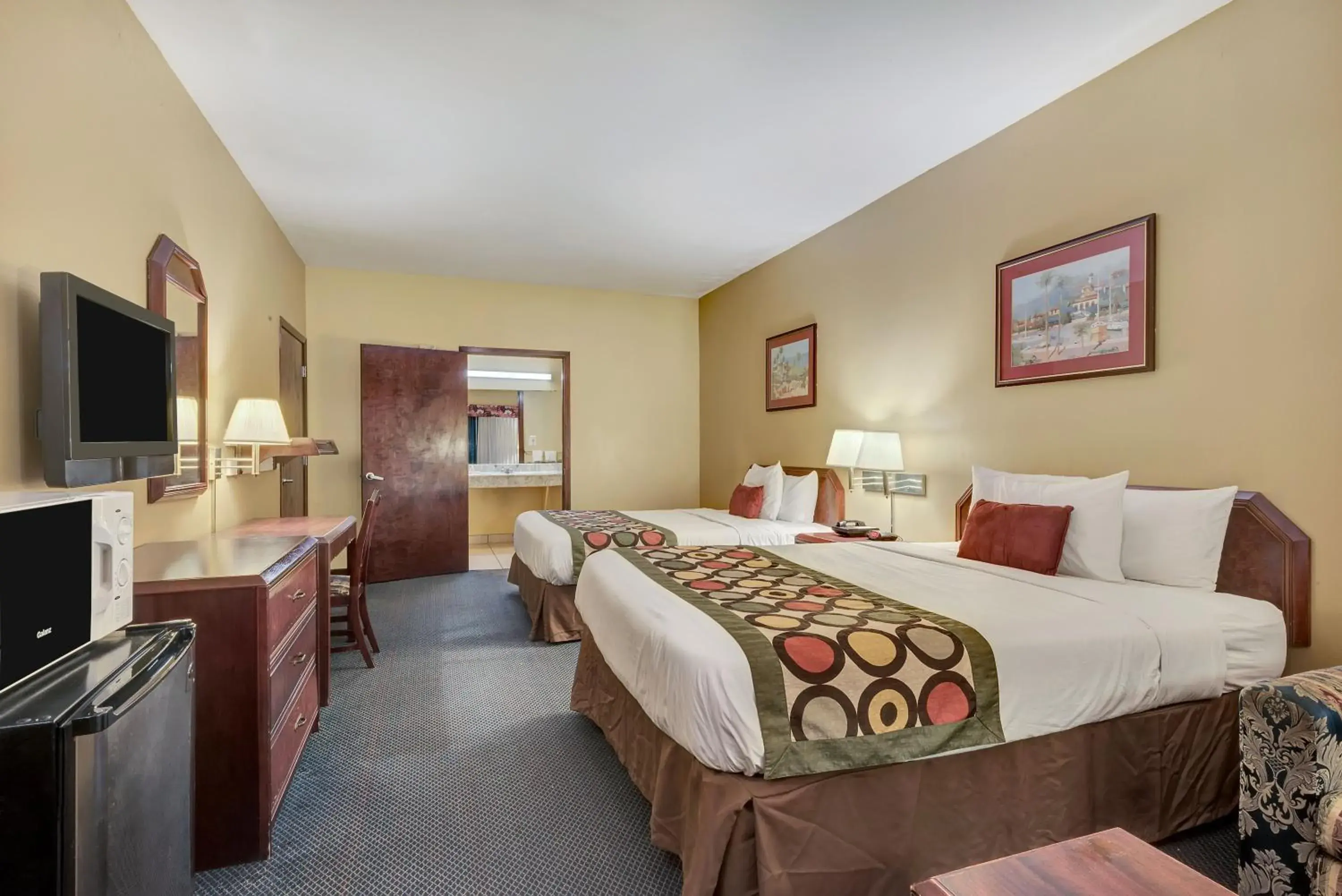 Living room, Bed in Super 8 by Wyndham Weslaco Living room, Bed in Super 8 by Wyndham Weslaco