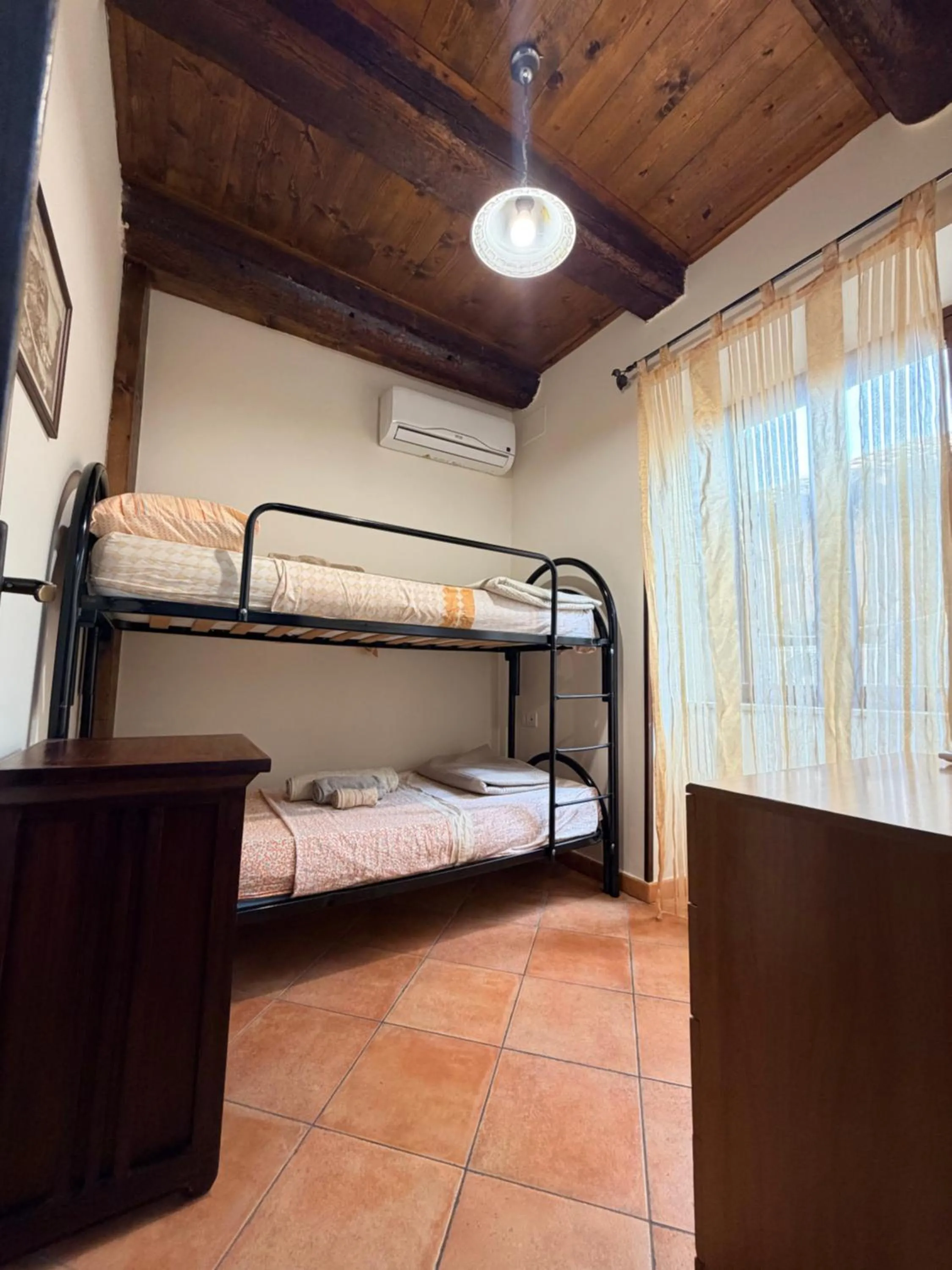Bed in Appartamento Cortese