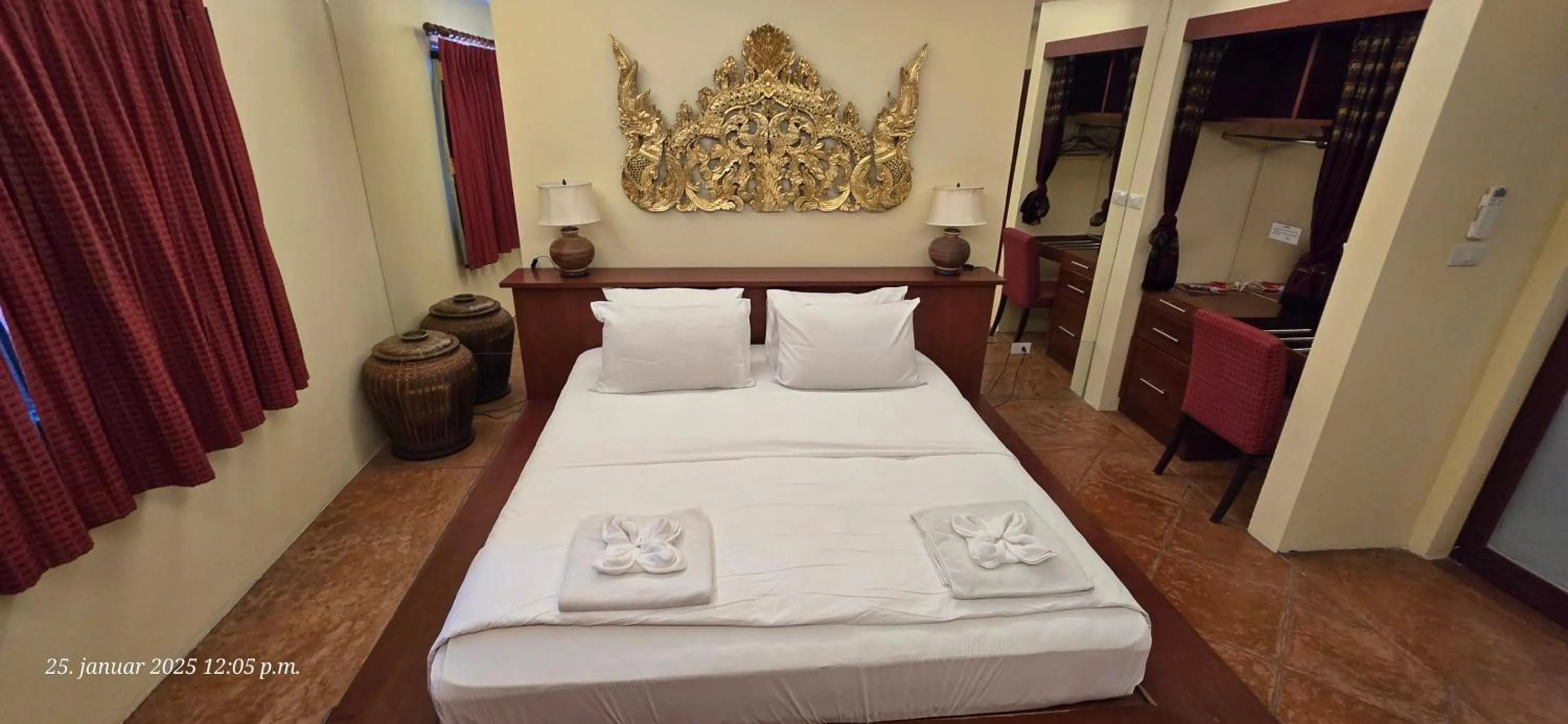 Bed in Nirvana Boutique Suites