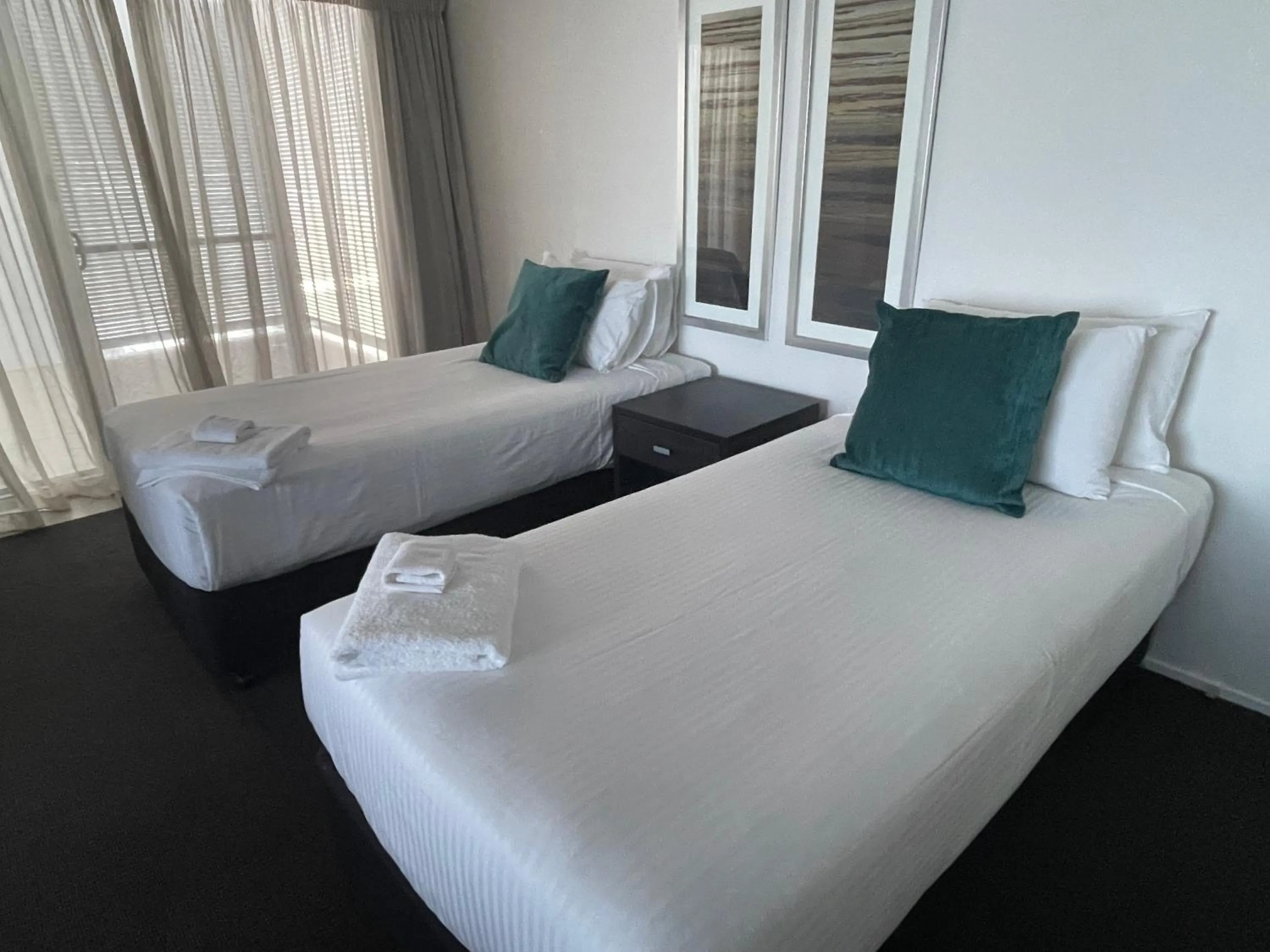 Bed in Ramada Hotel & Suites by Wyndham Ballina Byron
