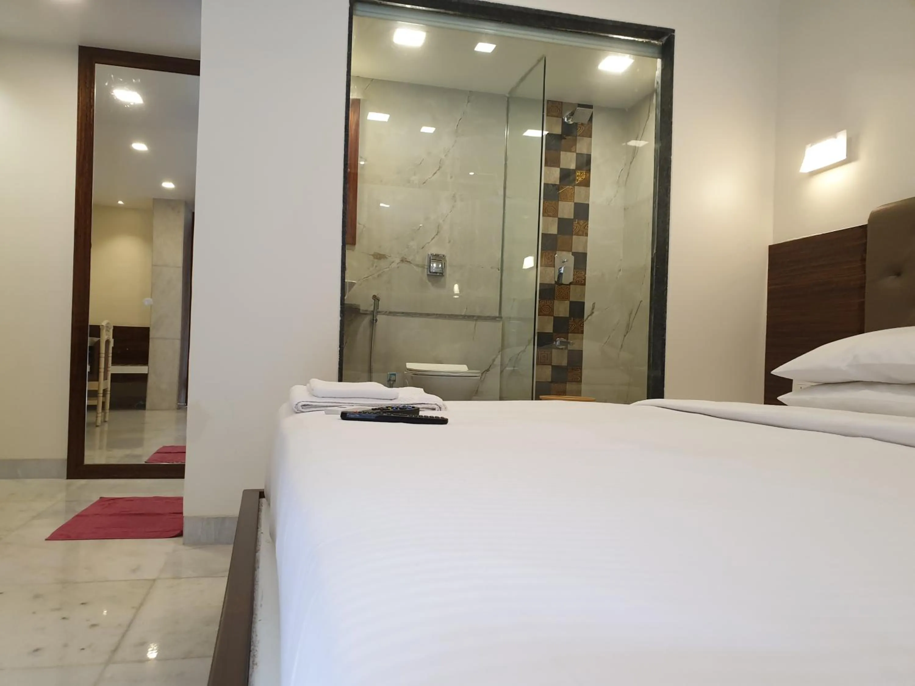 Bed in Hotel Milan International