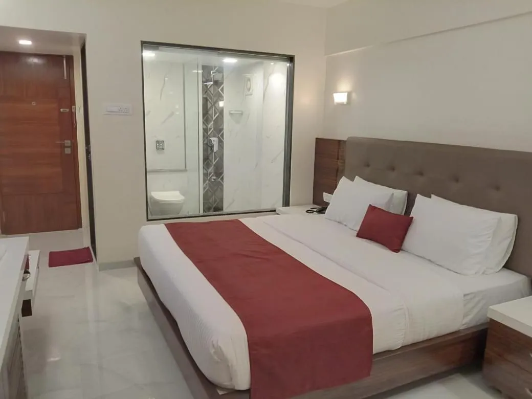 Bed in Hotel Milan International