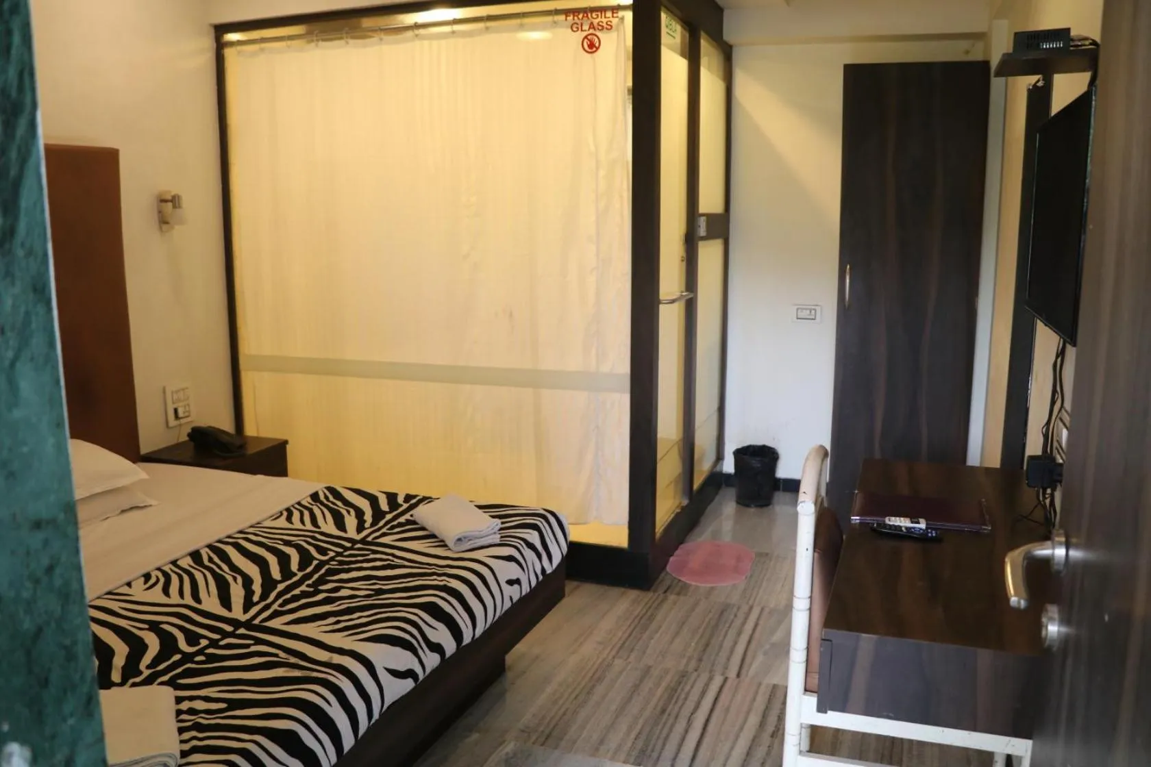 Bed in Hotel Milan International