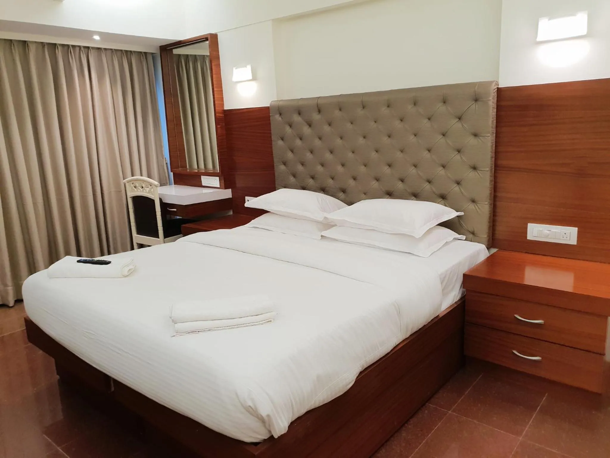 Bed in Hotel Milan International