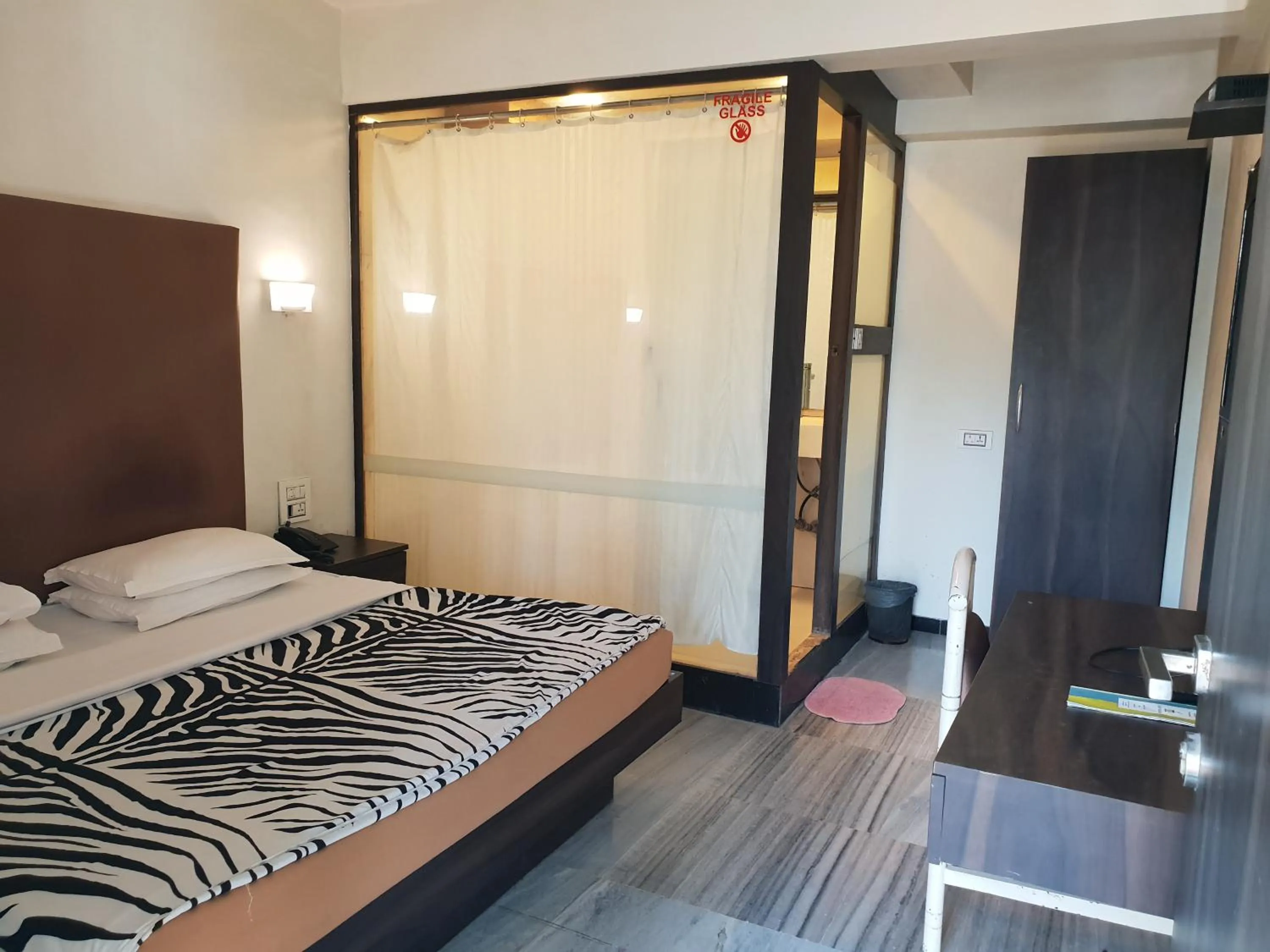 Bed in Hotel Milan International