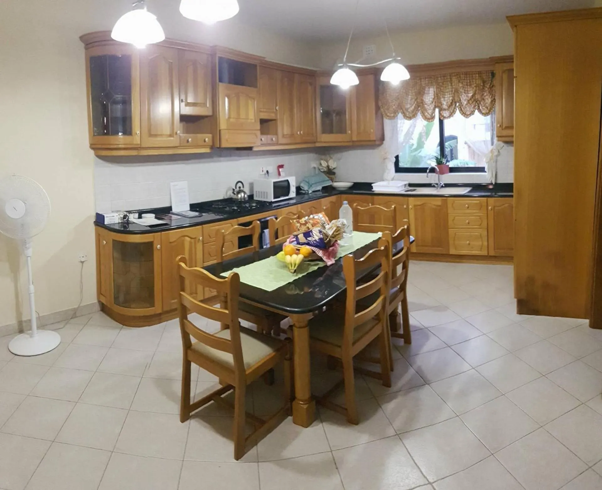 Kitchen or kitchenette in Aurora Apartment