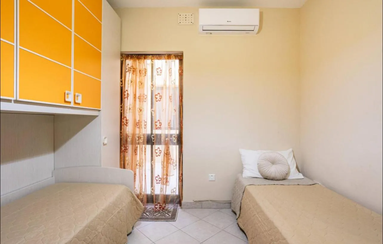 Bed in Aurora Apartment