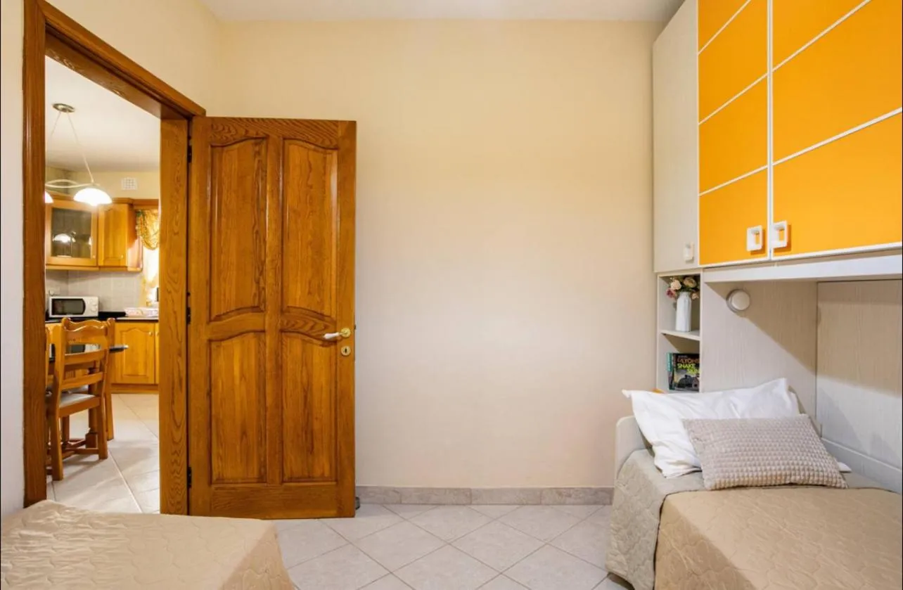 Bed in Aurora Apartment