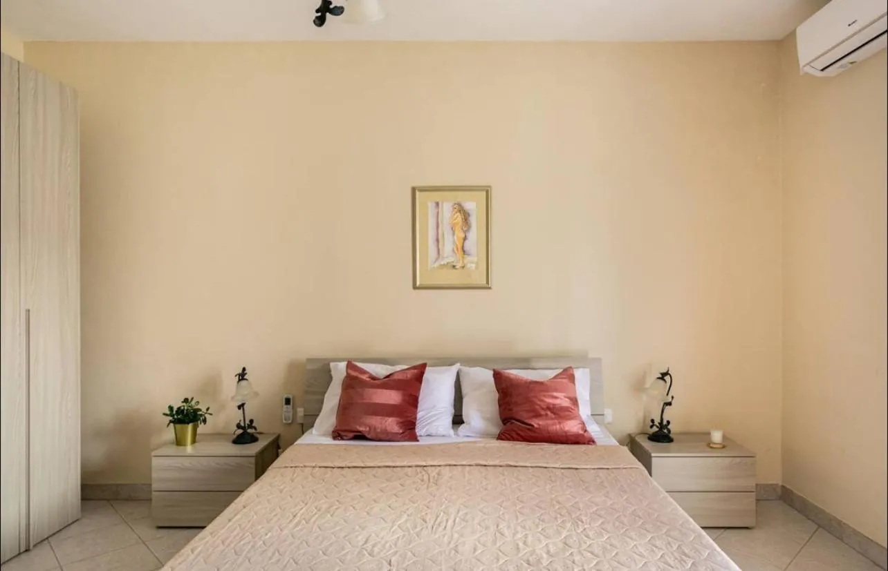 Bed in Aurora Apartment