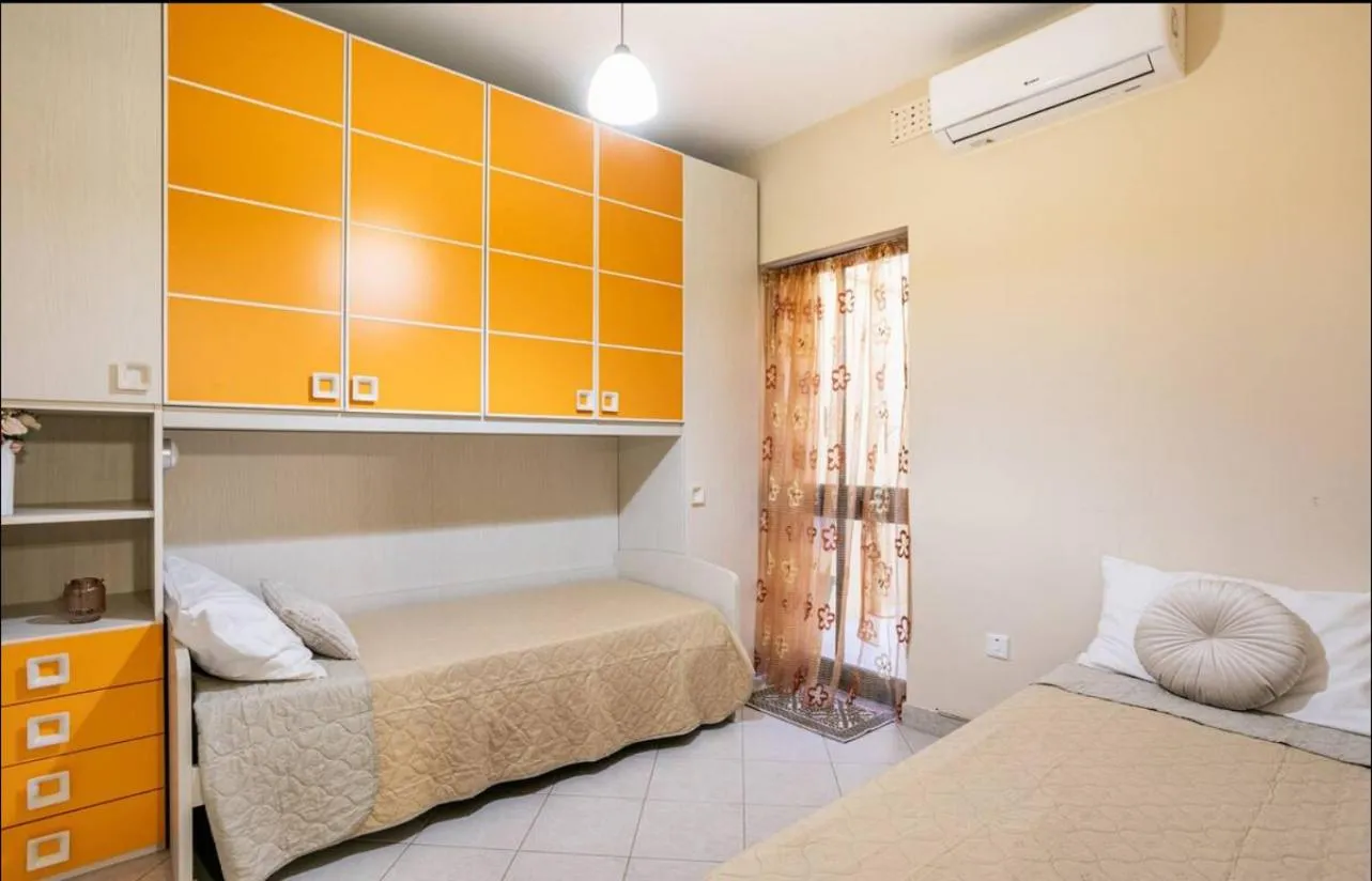Bed in Aurora Apartment