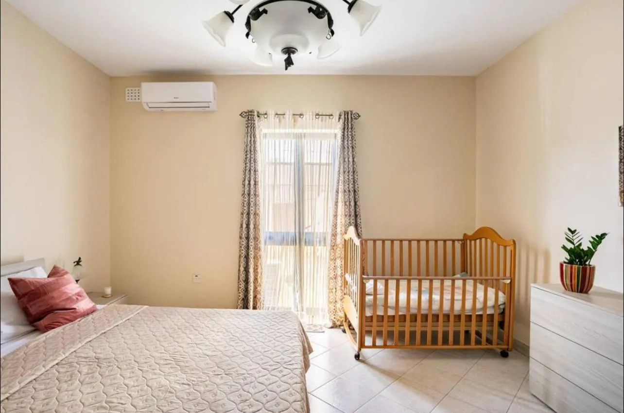Bed in Aurora Apartment