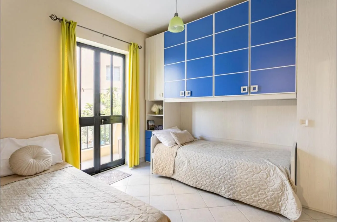 Bed in Aurora Apartment