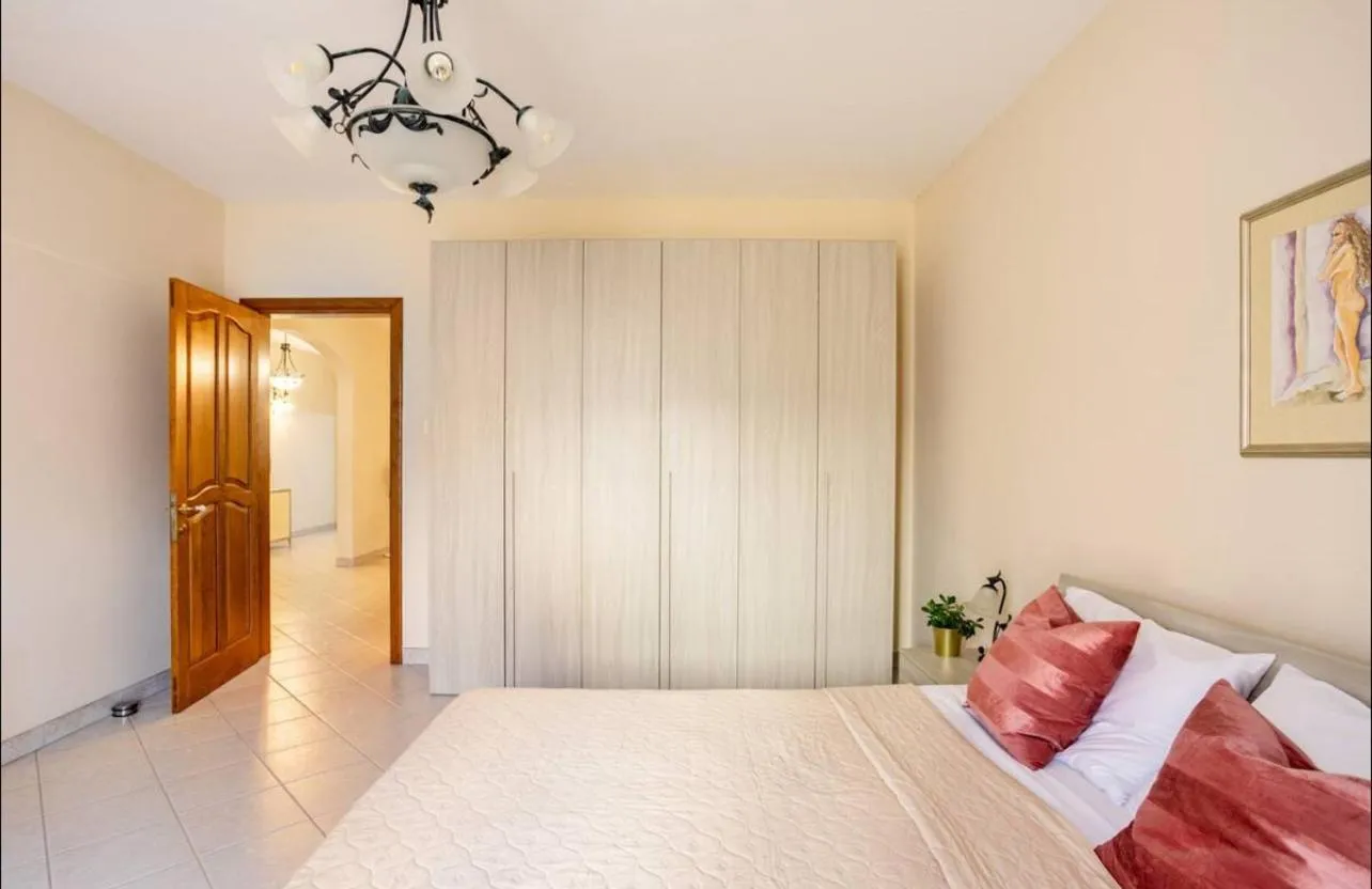 Bed in Aurora Apartment