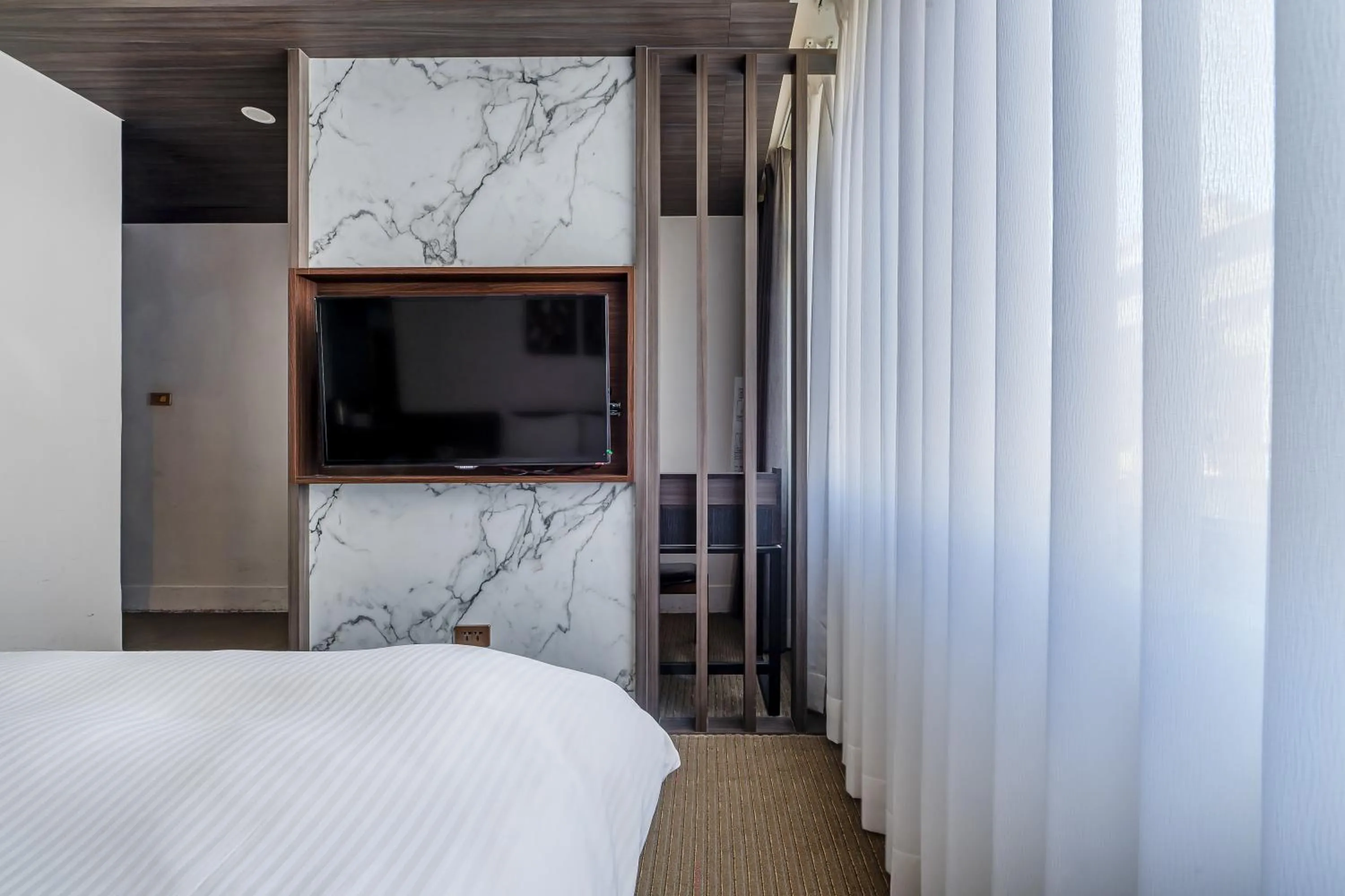 Bed in Dream Mansion Hotel