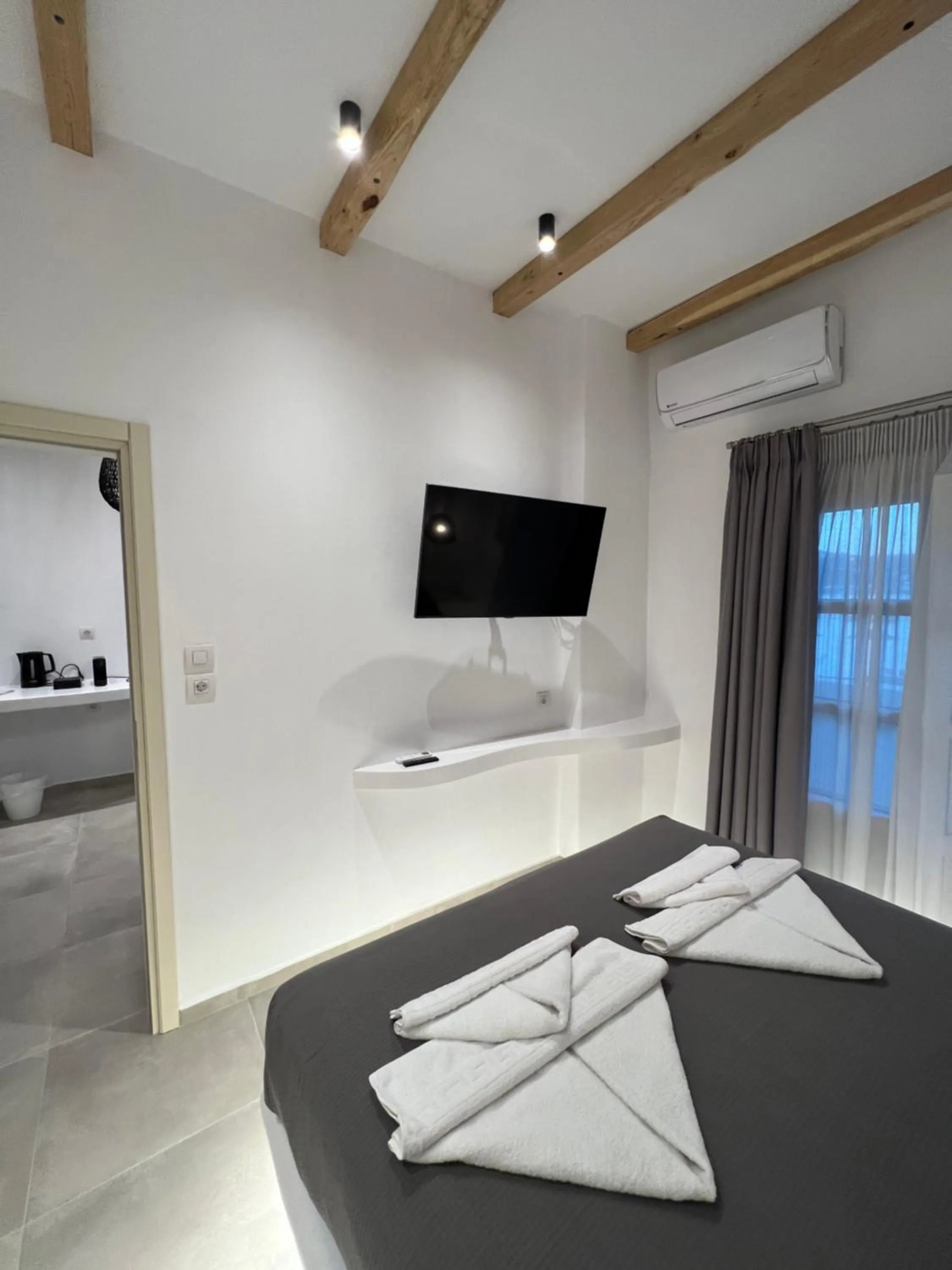 Bed in Alidian bay Suites Leros