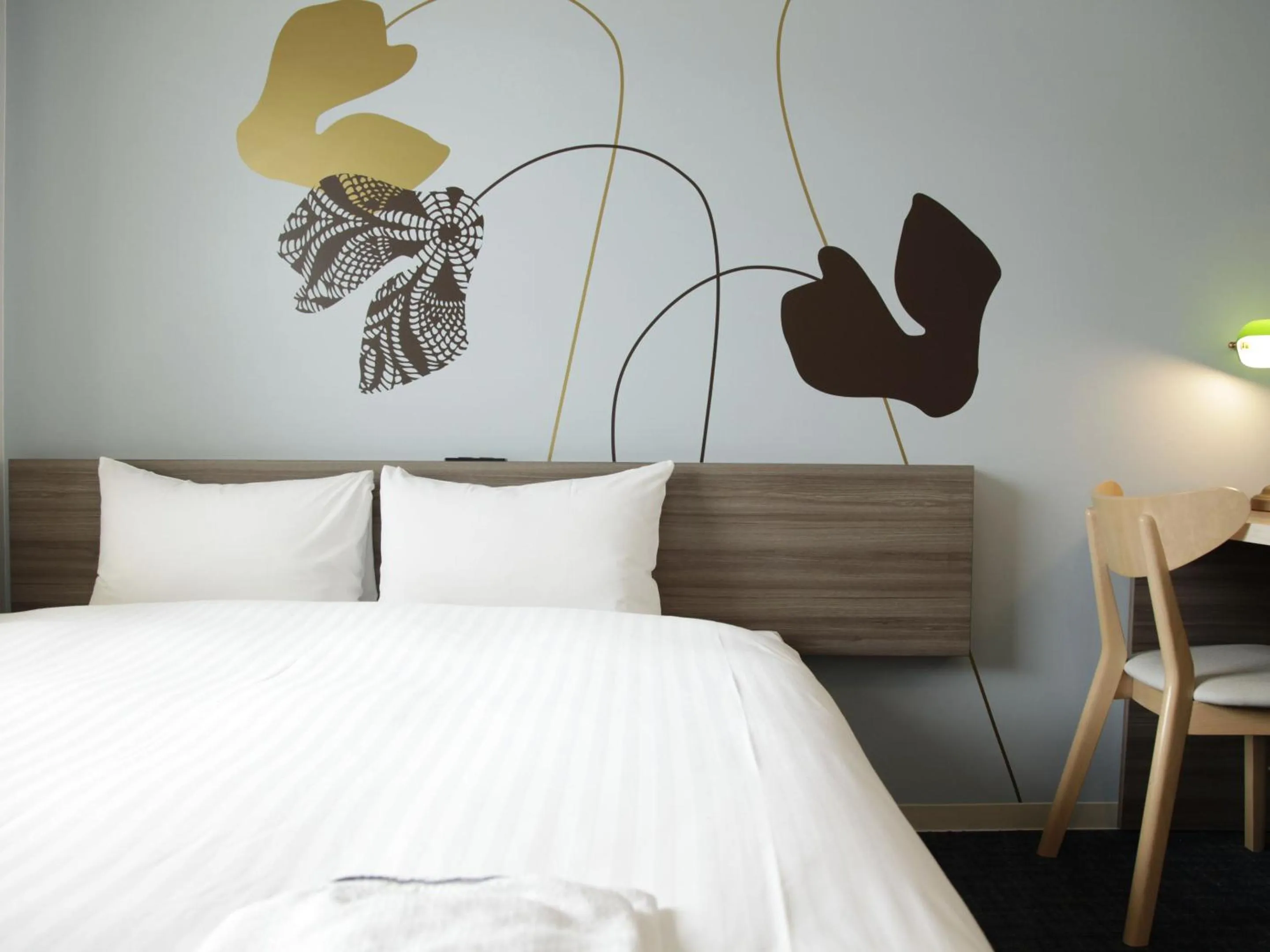 Bed in Hotel Azat Naha