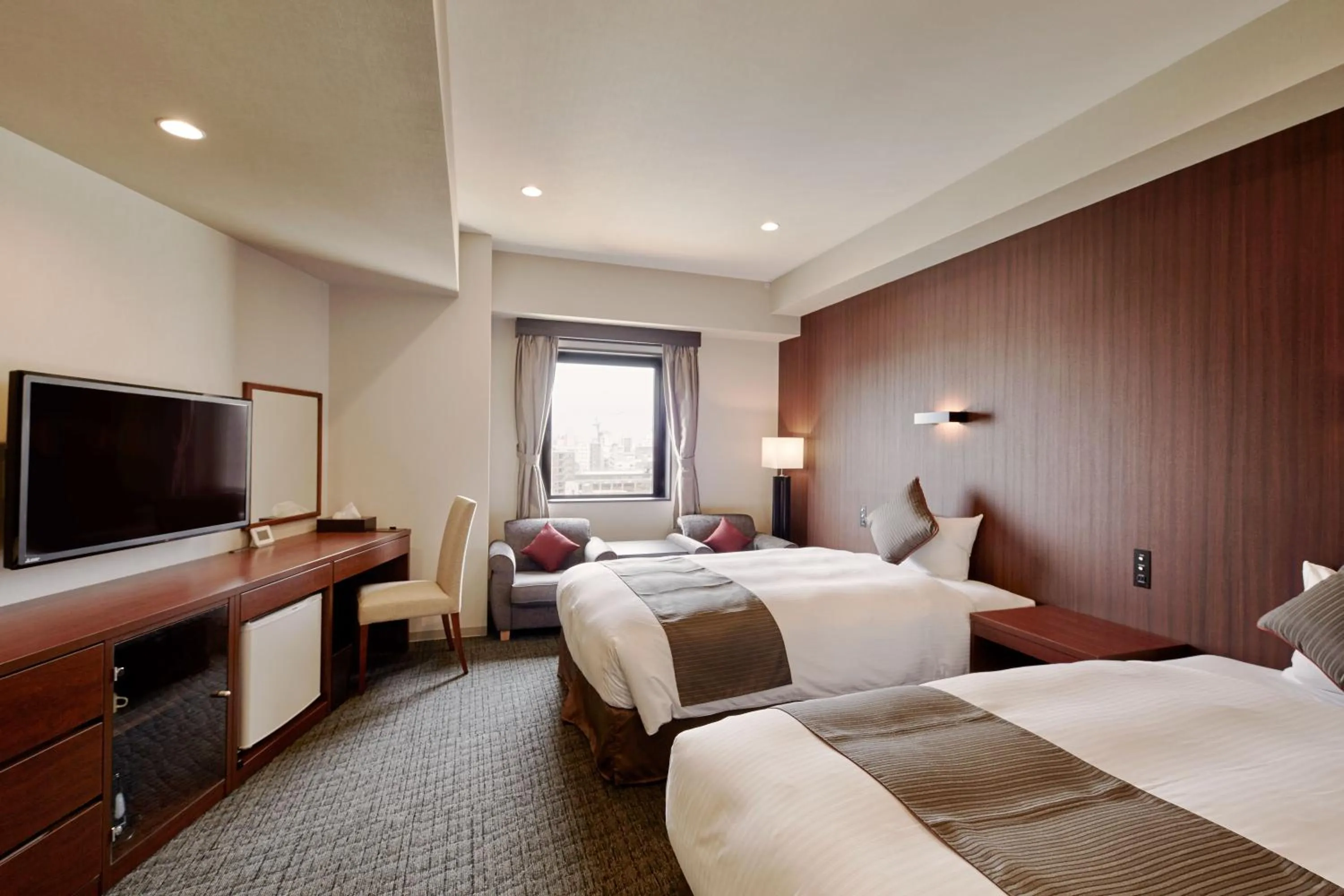 Bed in Hotel Azat Naha