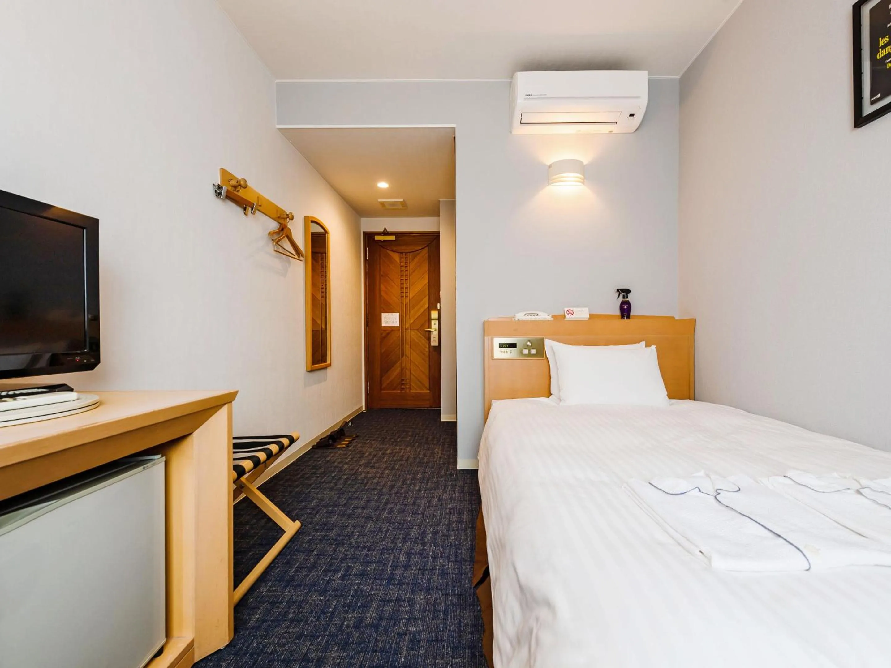 Bed in Hotel Azat Naha