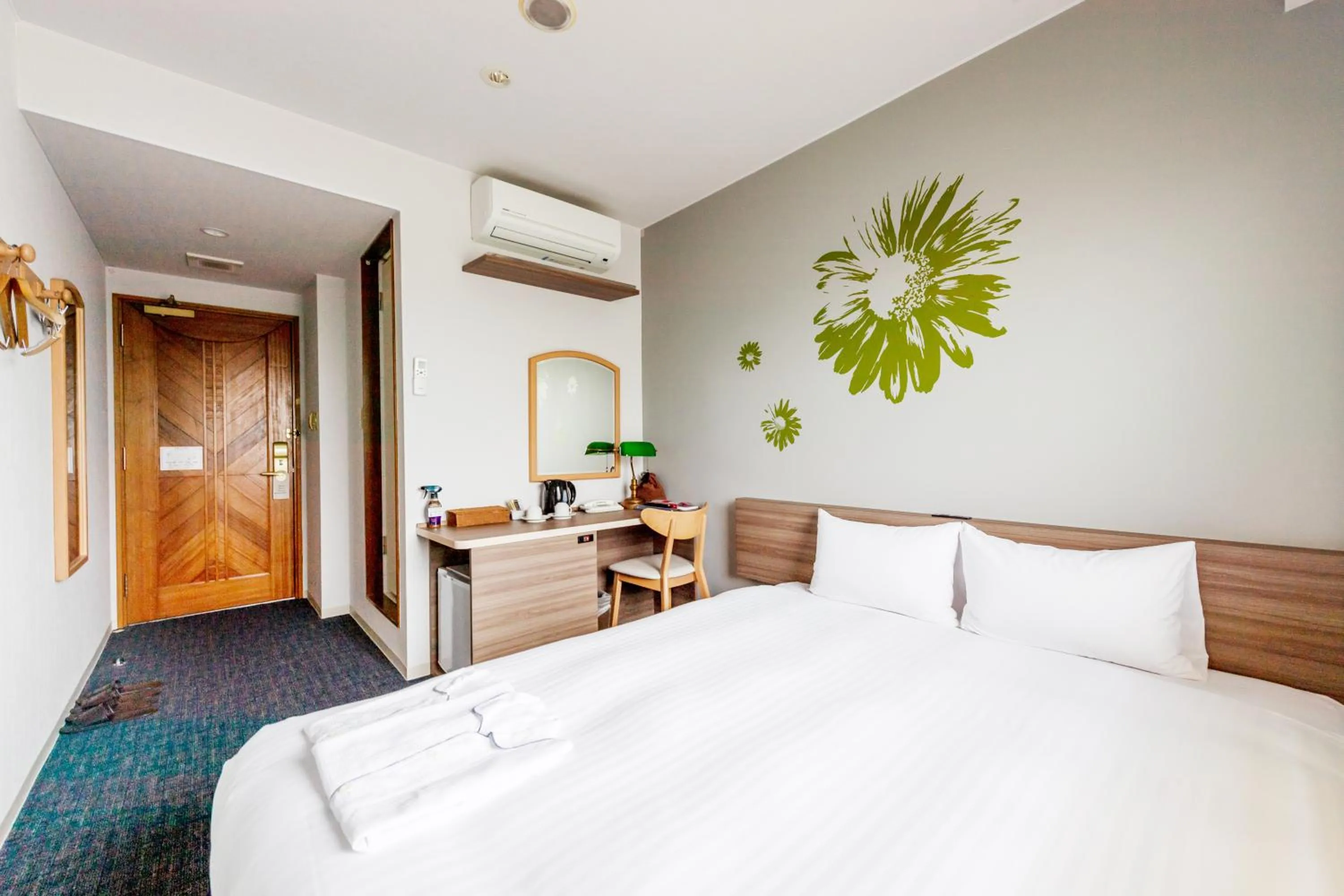 Bed in Hotel Azat Naha