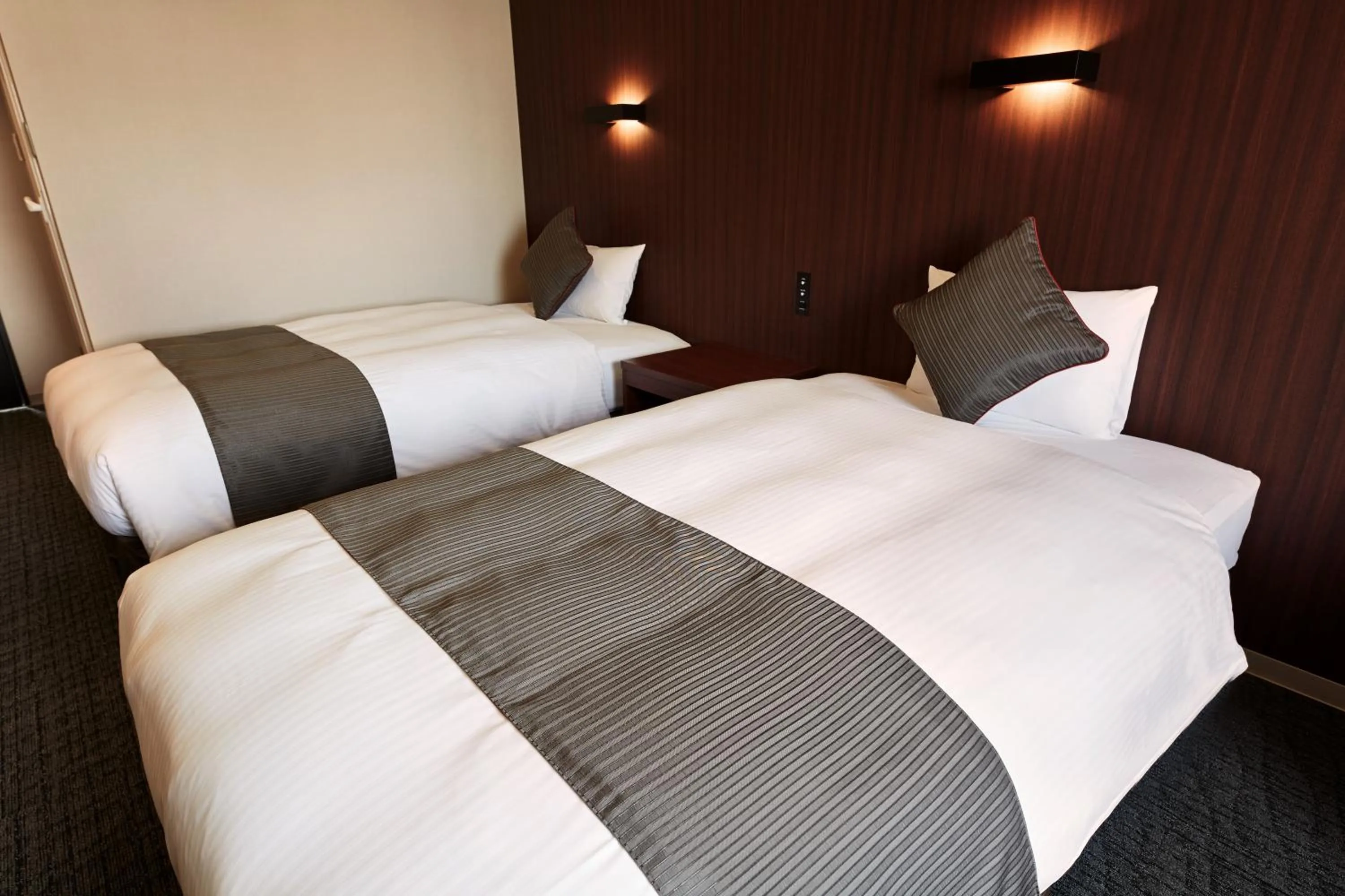 Bed in Hotel Azat Naha